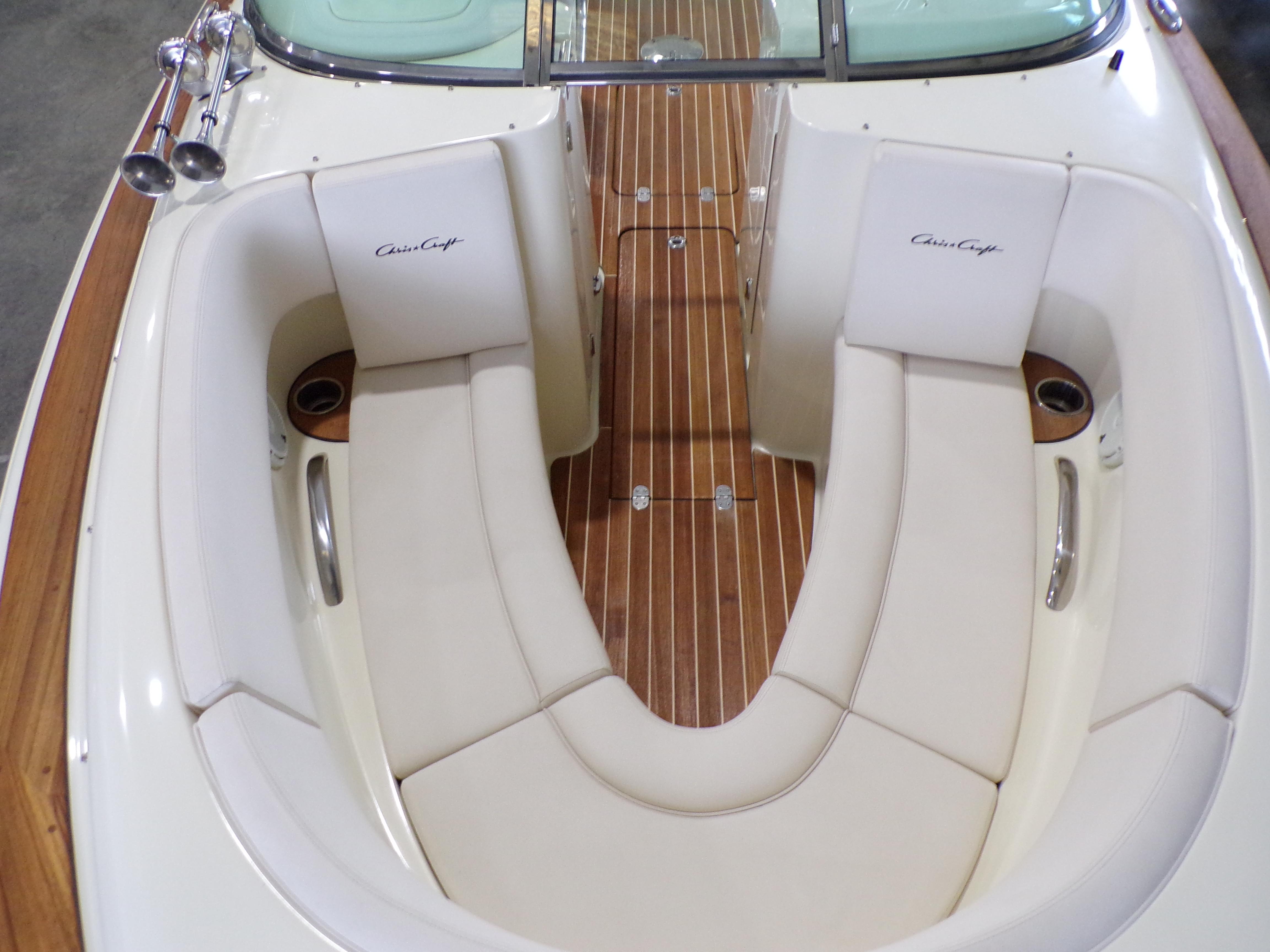 Interior of a 2021 Chris-Craft Launch 27 with elegant seating.