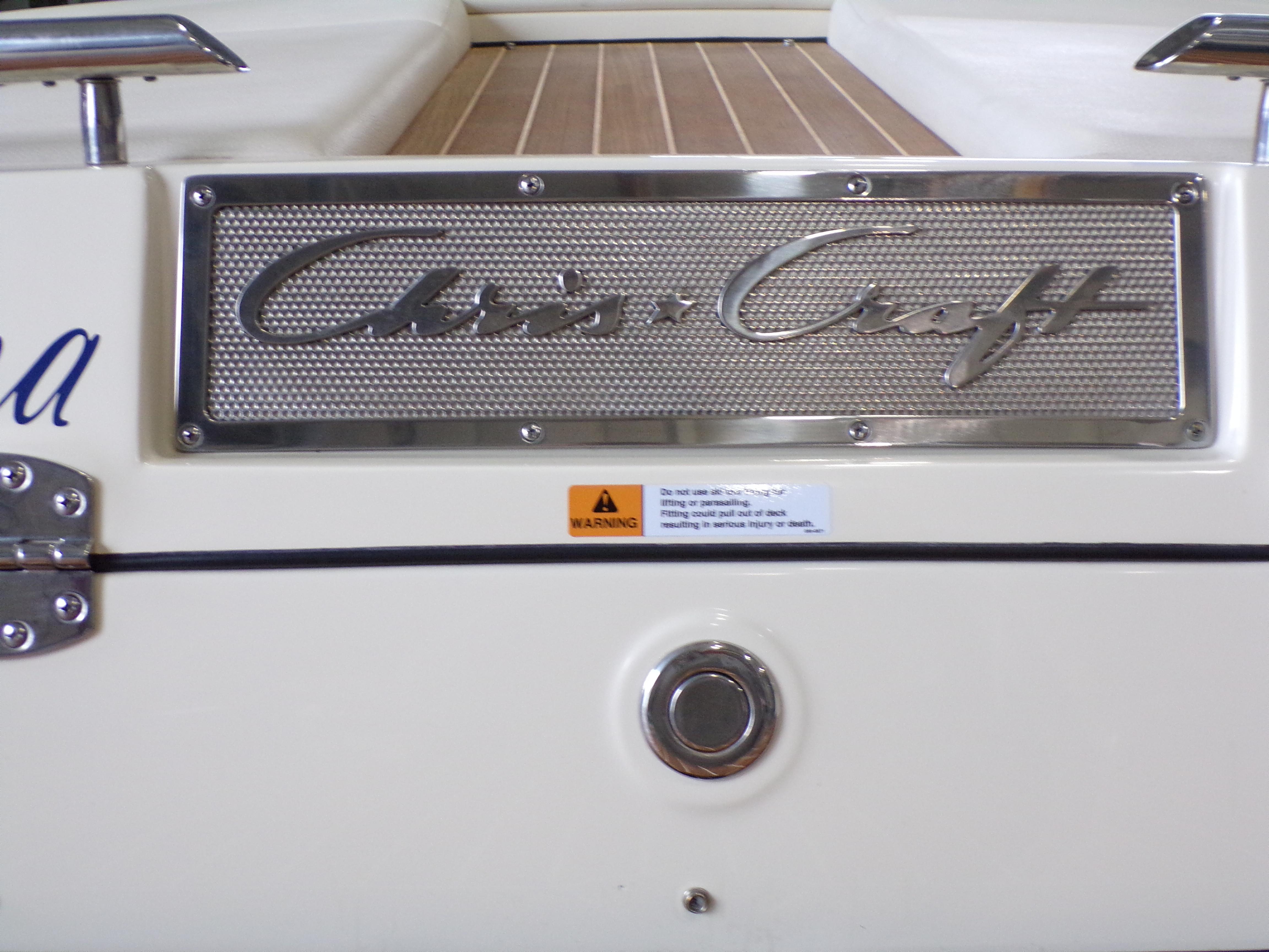 Chris-Craft Launch 27 boat, 2021 model, nameplate and warning label.