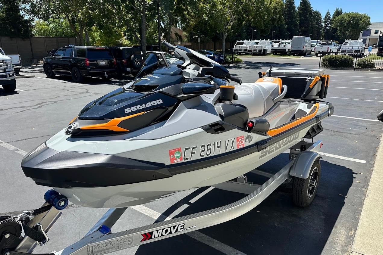 2023 Sea-Doo Fish Pro Trophy on trailer in parking lot.