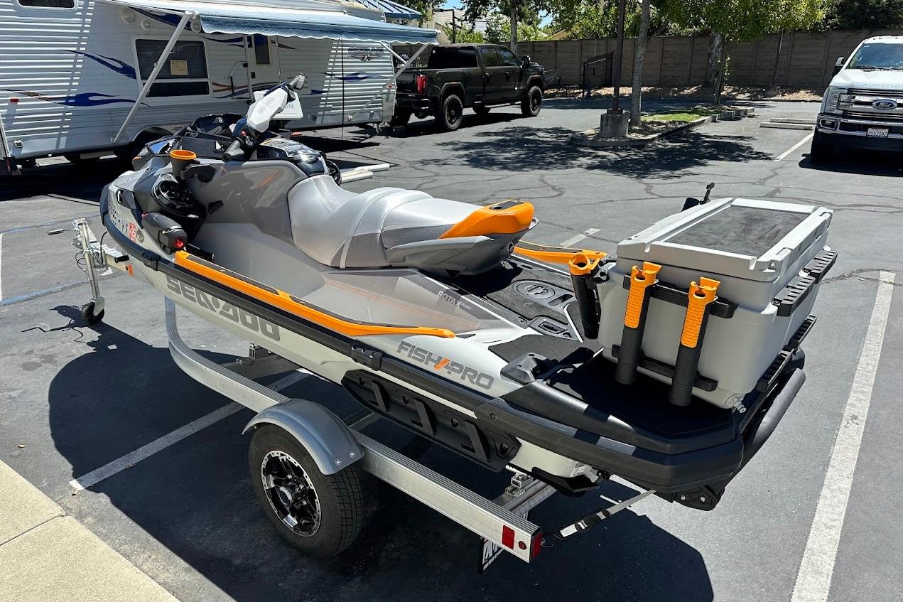 2023 Sea-Doo Fish Pro Trophy on trailer, parked in sunny lot.