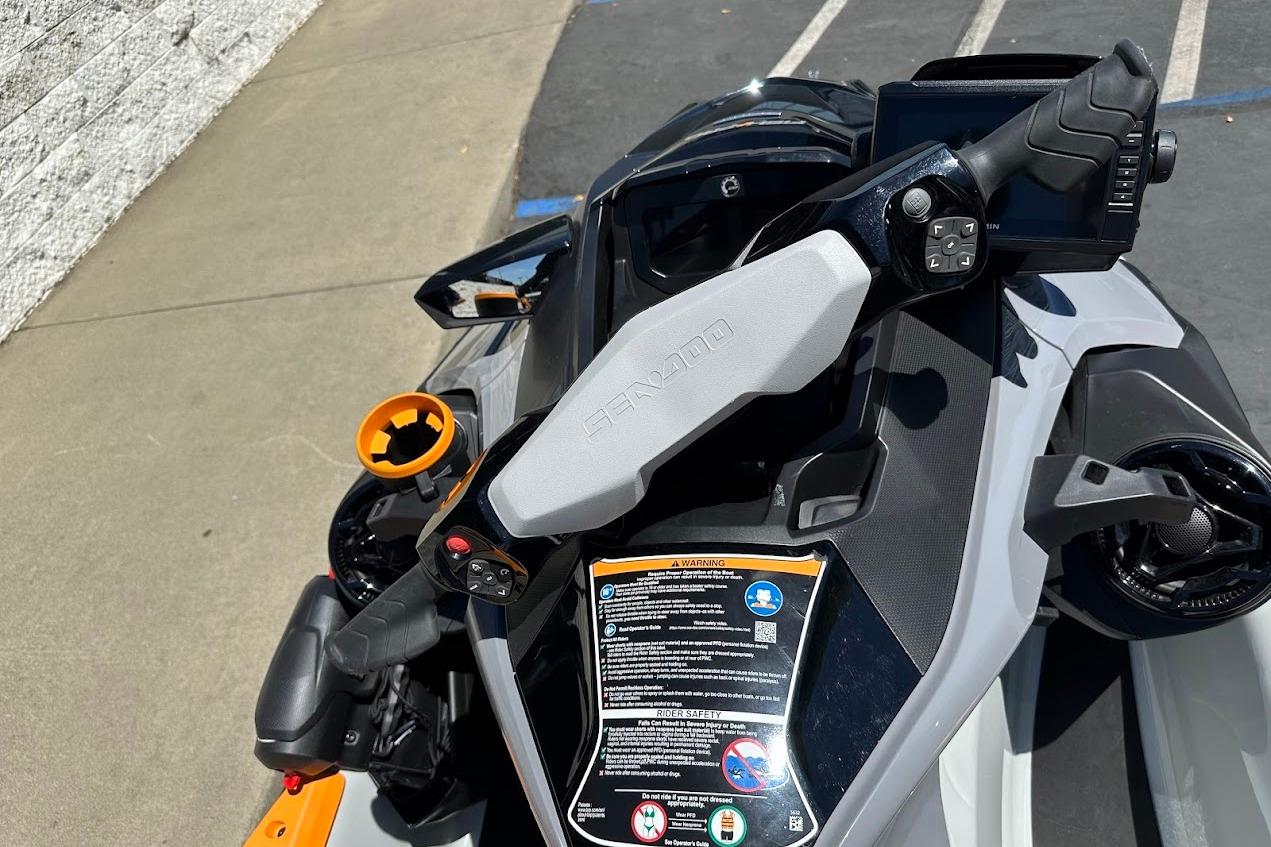 2023 Sea-Doo Fish Pro Trophy dashboard with controls and display, parked on pavement.
