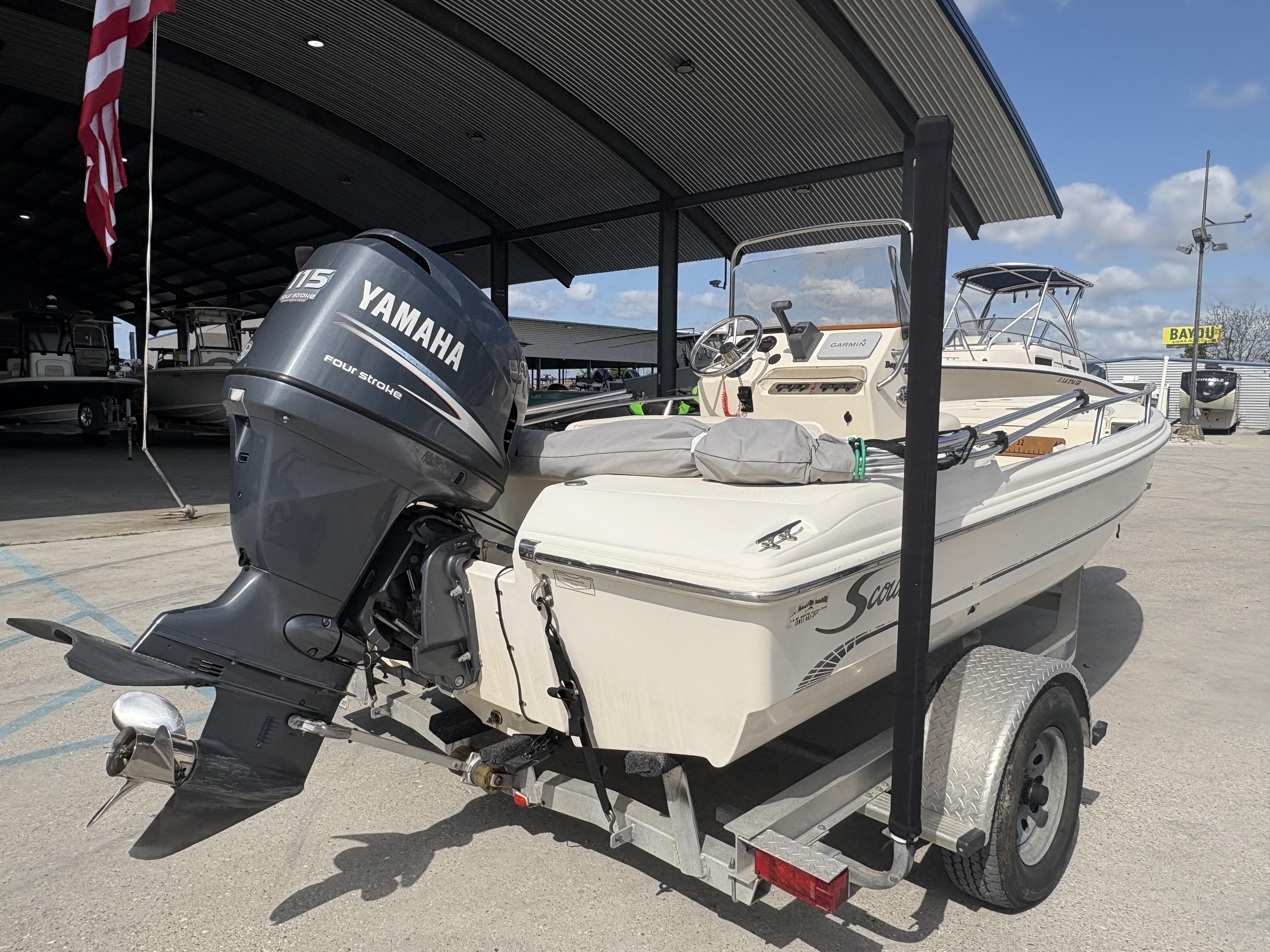 2005 Scout 17 boat with Yamaha 115 outboard motor on a trailer.