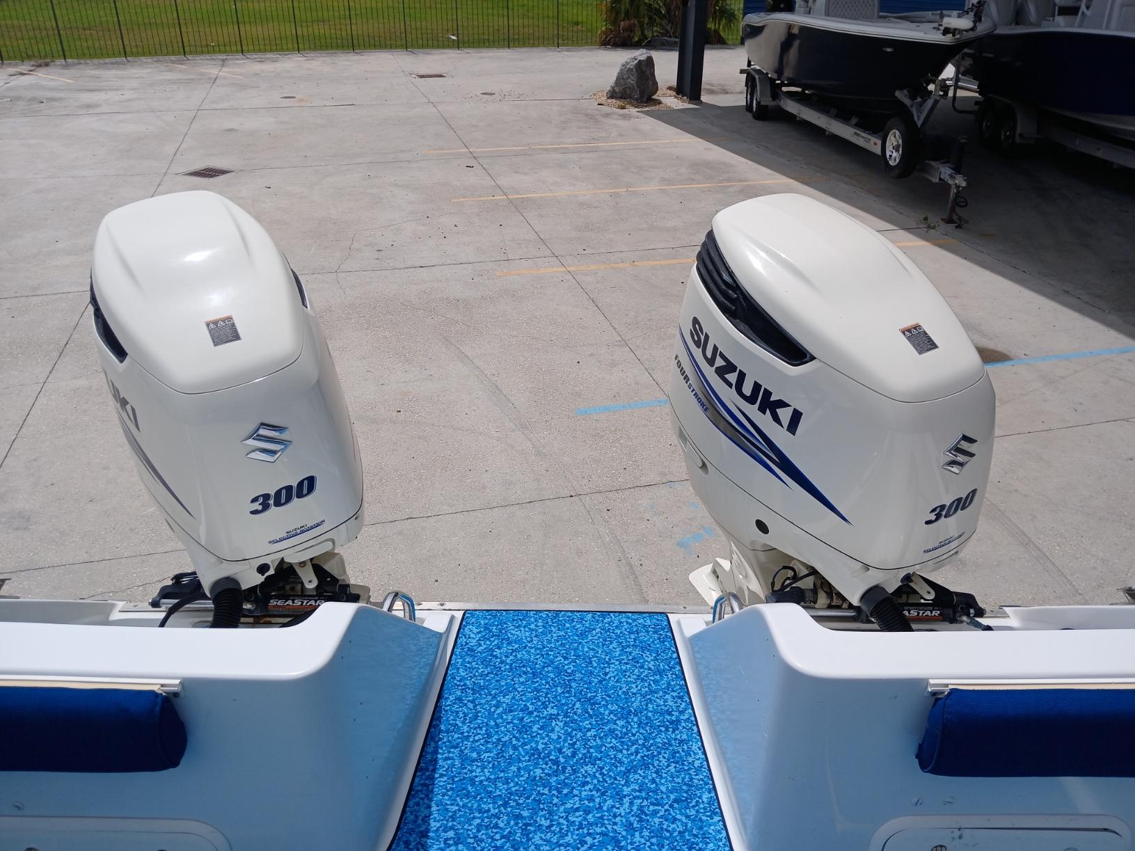 Twin Suzuki 300 outboard motors on a 2002 ProKat 2860 Center Console boat.