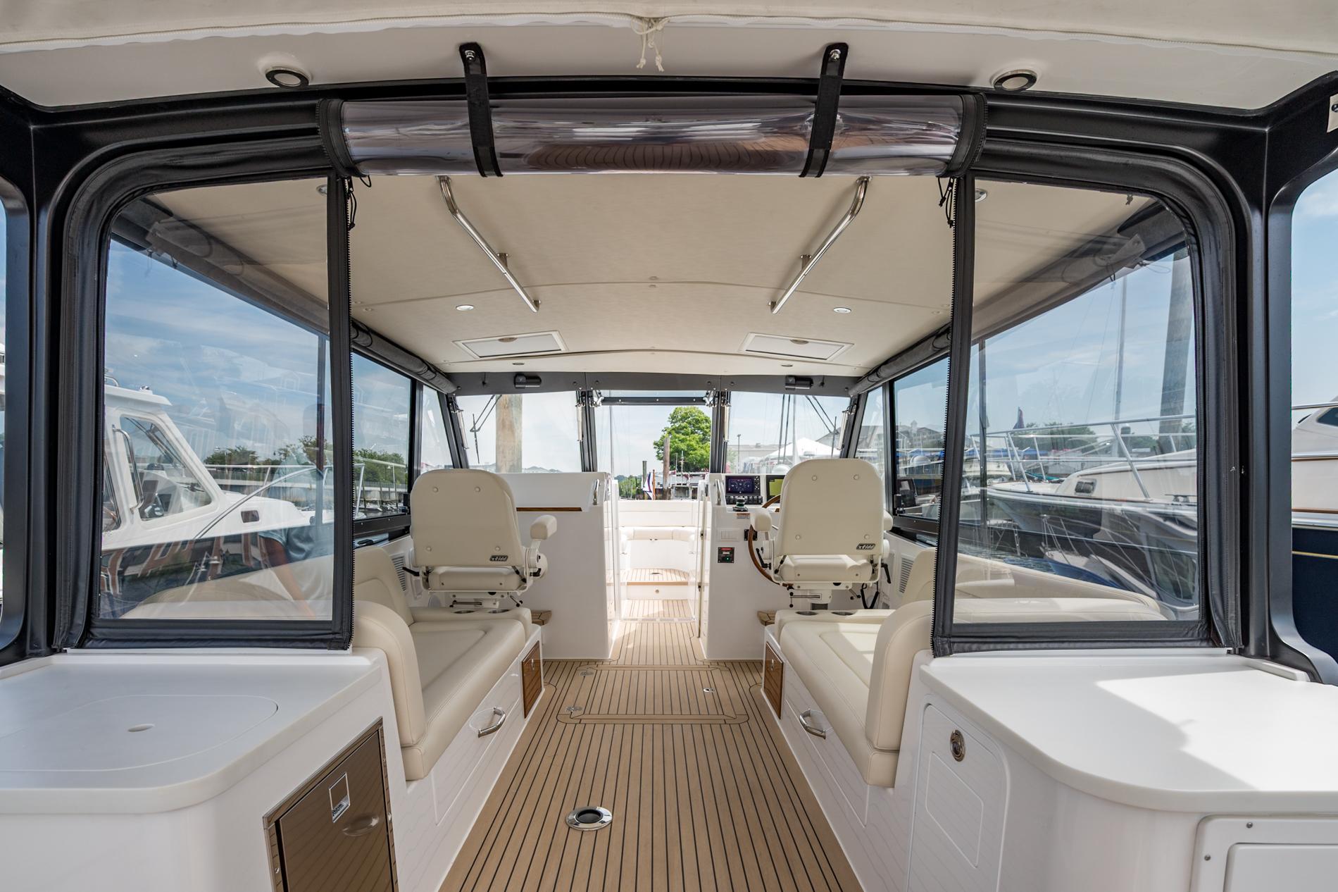 Interior view of 2025 MJM 3 boat, featuring sleek seating and modern design.
