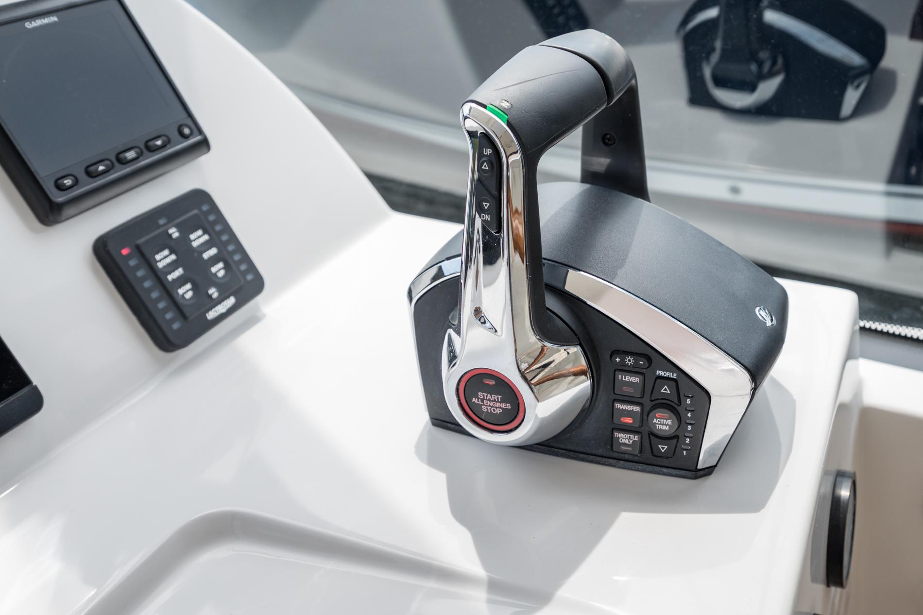Control panel of 2025 MJM 3 boat with advanced throttle system.