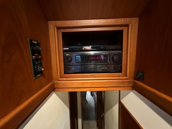 1988 Buddy Davis Convertible interior with built-in stereo system and wooden cabinetry.