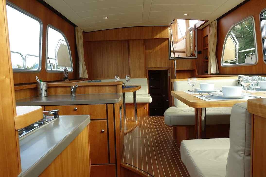 Luxurious interior of 2014 Linssen Grand Sturdy 40.9 AC yacht with elegant wood finish.