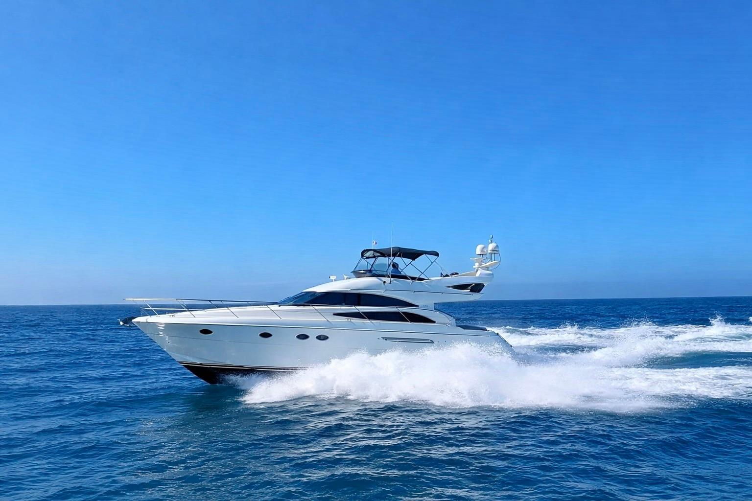 2007 Viking Sport Cruisers 50 yacht cruising on open blue sea.