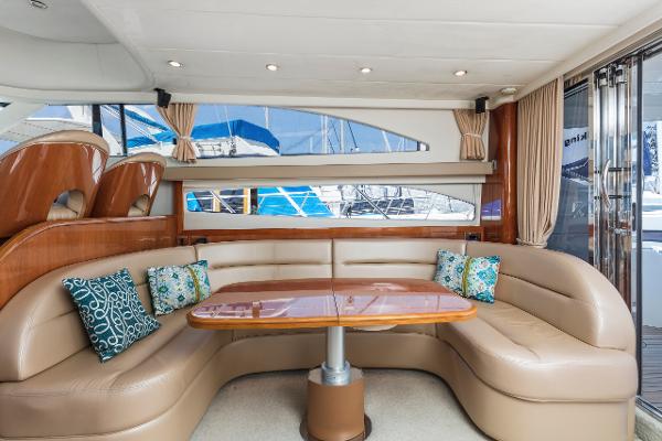 Luxurious interior of a 2007 Viking Sport Cruiser with plush seating and decorative pillows.