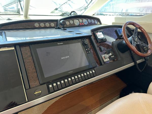 2007 Viking Sport Cruiser dashboard with navigation controls and steering wheel.