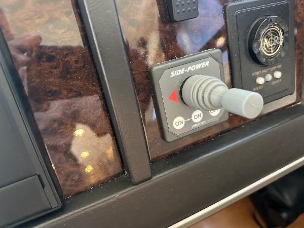 Control panel of a 2007 Viking Sport Cruiser with Side-Power thruster joystick.