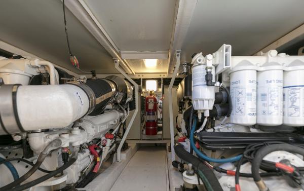 Engine room of a 2007 Viking Sport Cruiser, showcasing complex machinery and equipment.