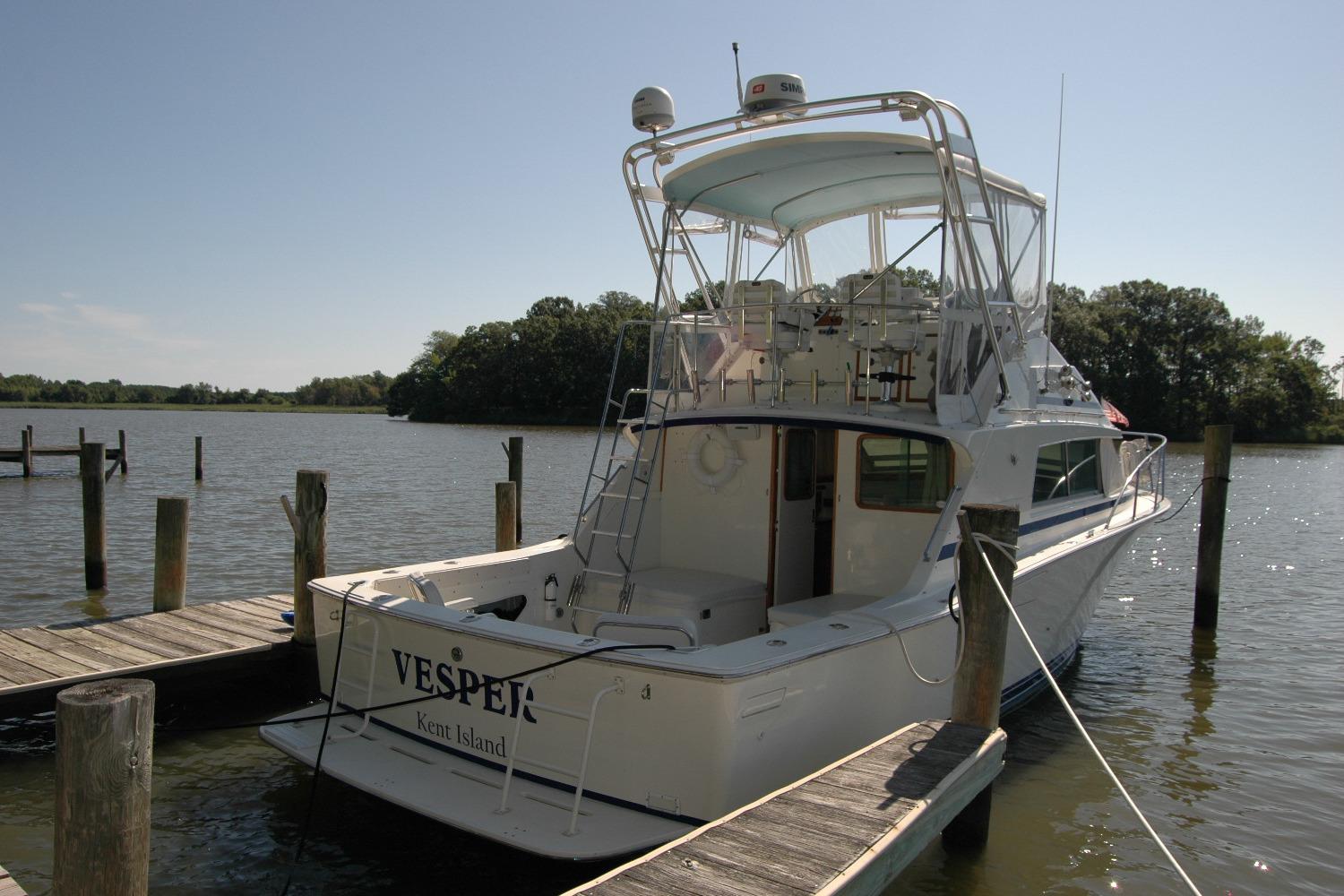 1987 Bertram 33 Sport Fisherman docked at Kent Island marina.