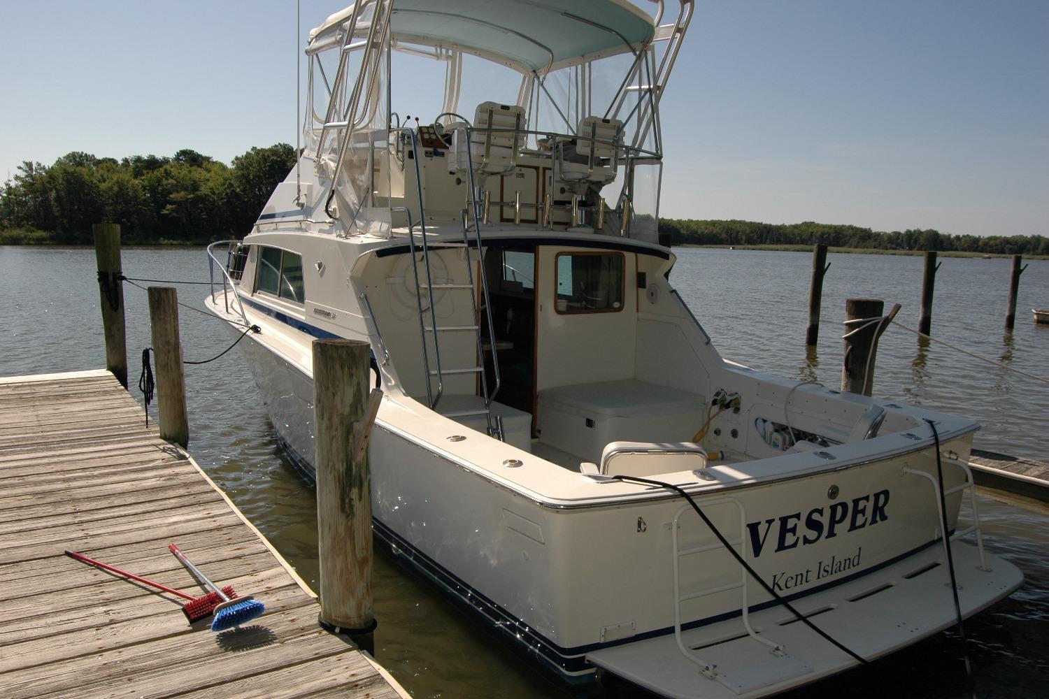 1987 Bertram 33 Sport Fisherman docked at Kent Island marina.