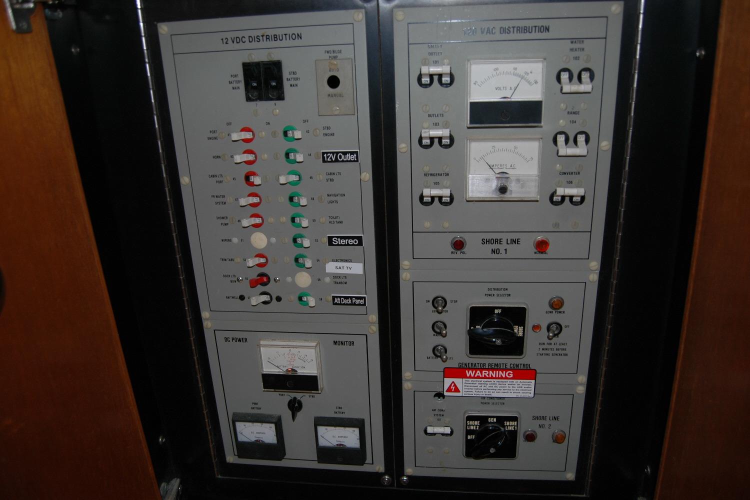 Electrical control panel on a 1987 Bertram 33 Sport Fisherman boat.