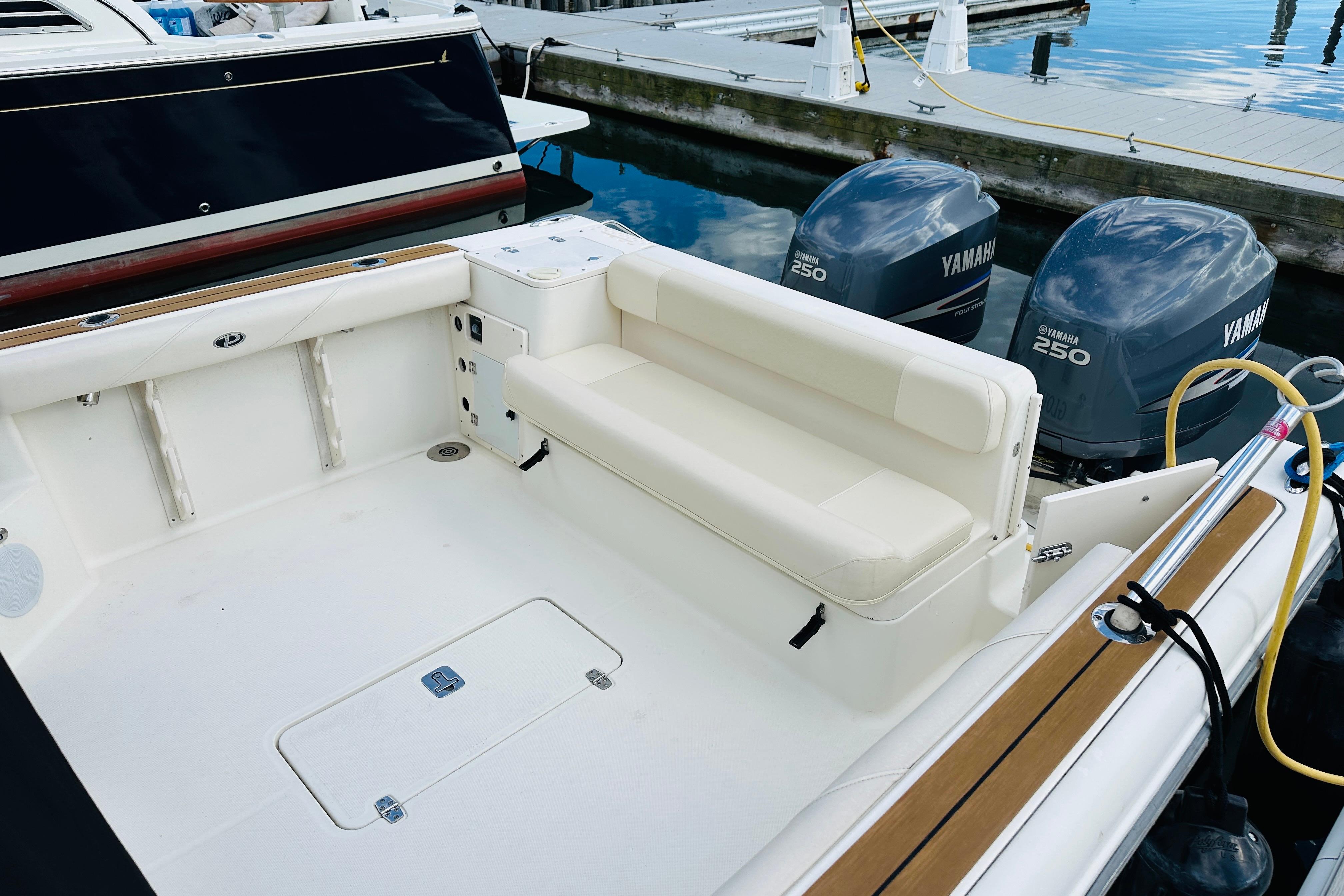 2007 Pursuit OS 285 Offshore boat with Yamaha 250 engines at dock.