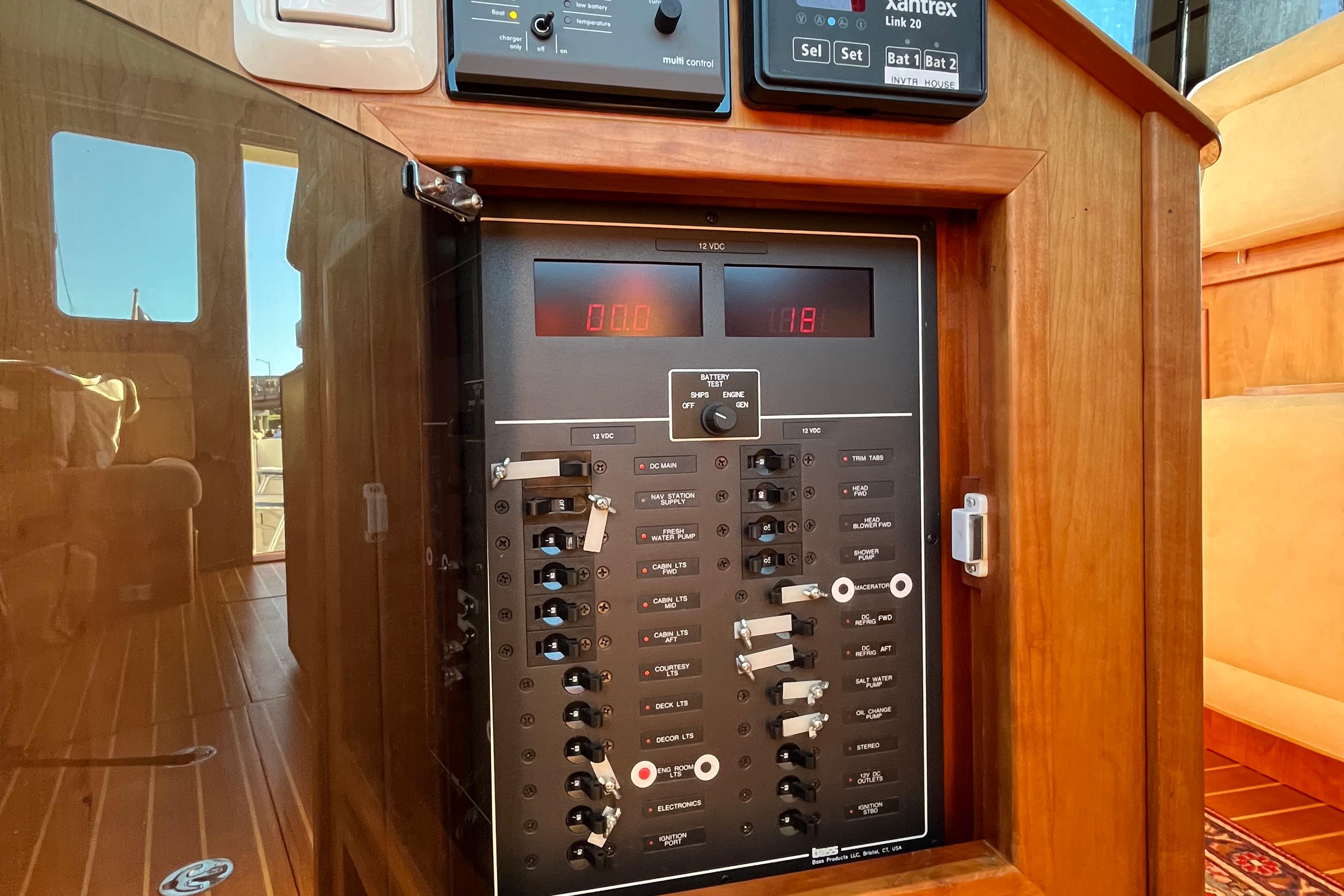 Electrical panel inside a 2006 Sabre 36 Flybridge Sedan boat, showcasing controls and switches.