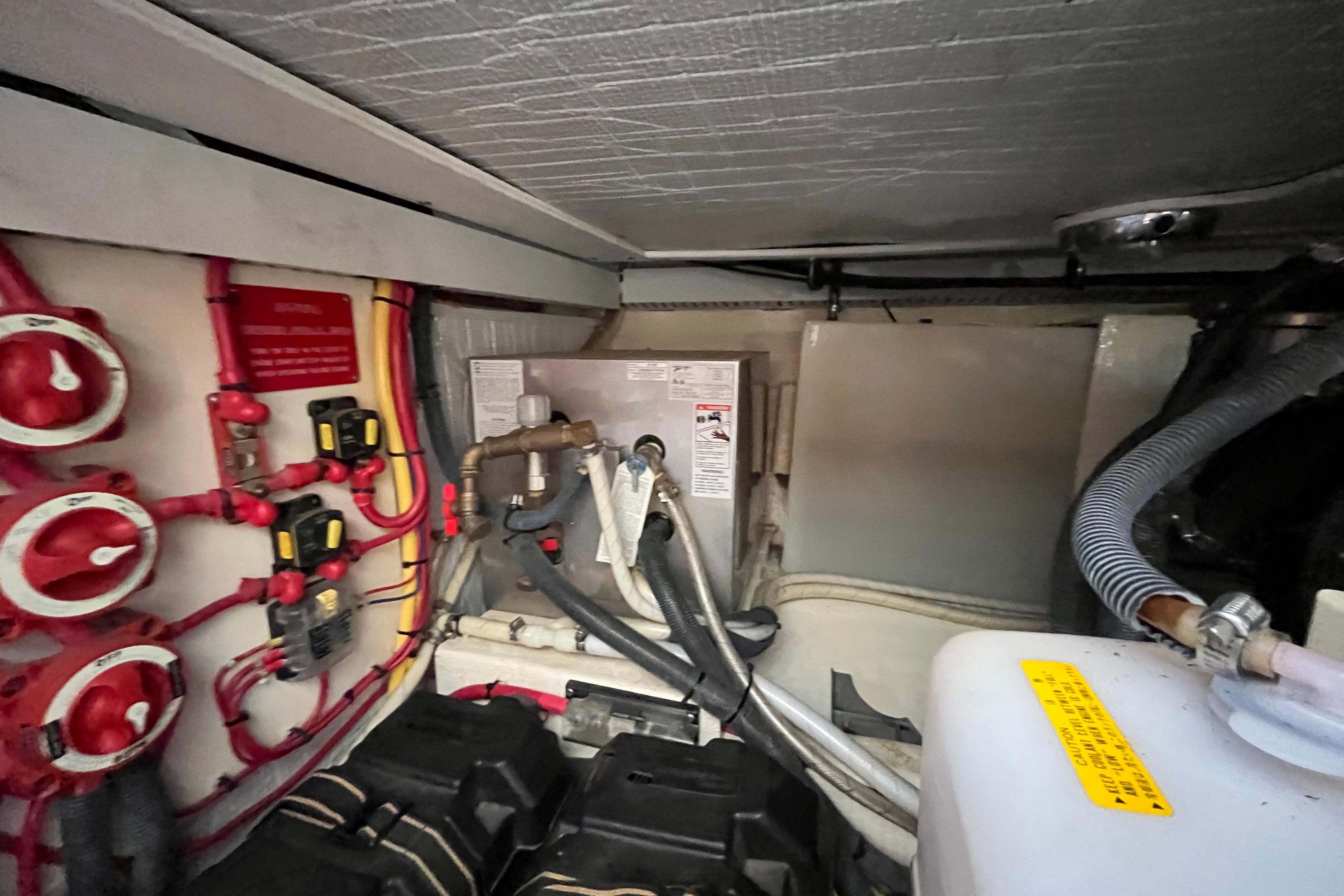 Engine room of 2006 Sabre 36 Flybridge Sedan with wiring and components.