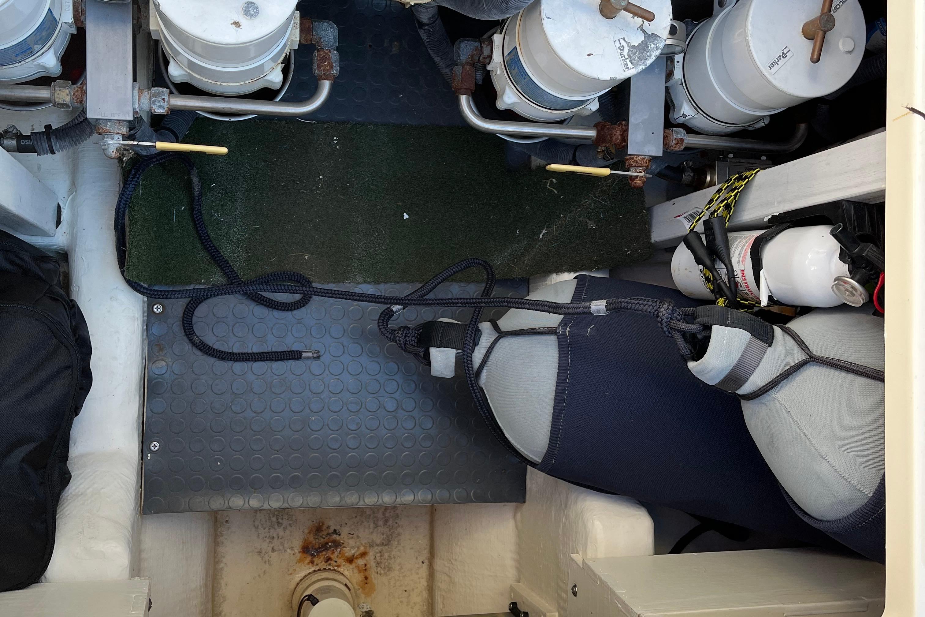 Engine compartment of a 2006 Sabre 36 Flybridge Sedan with visible components and equipment.