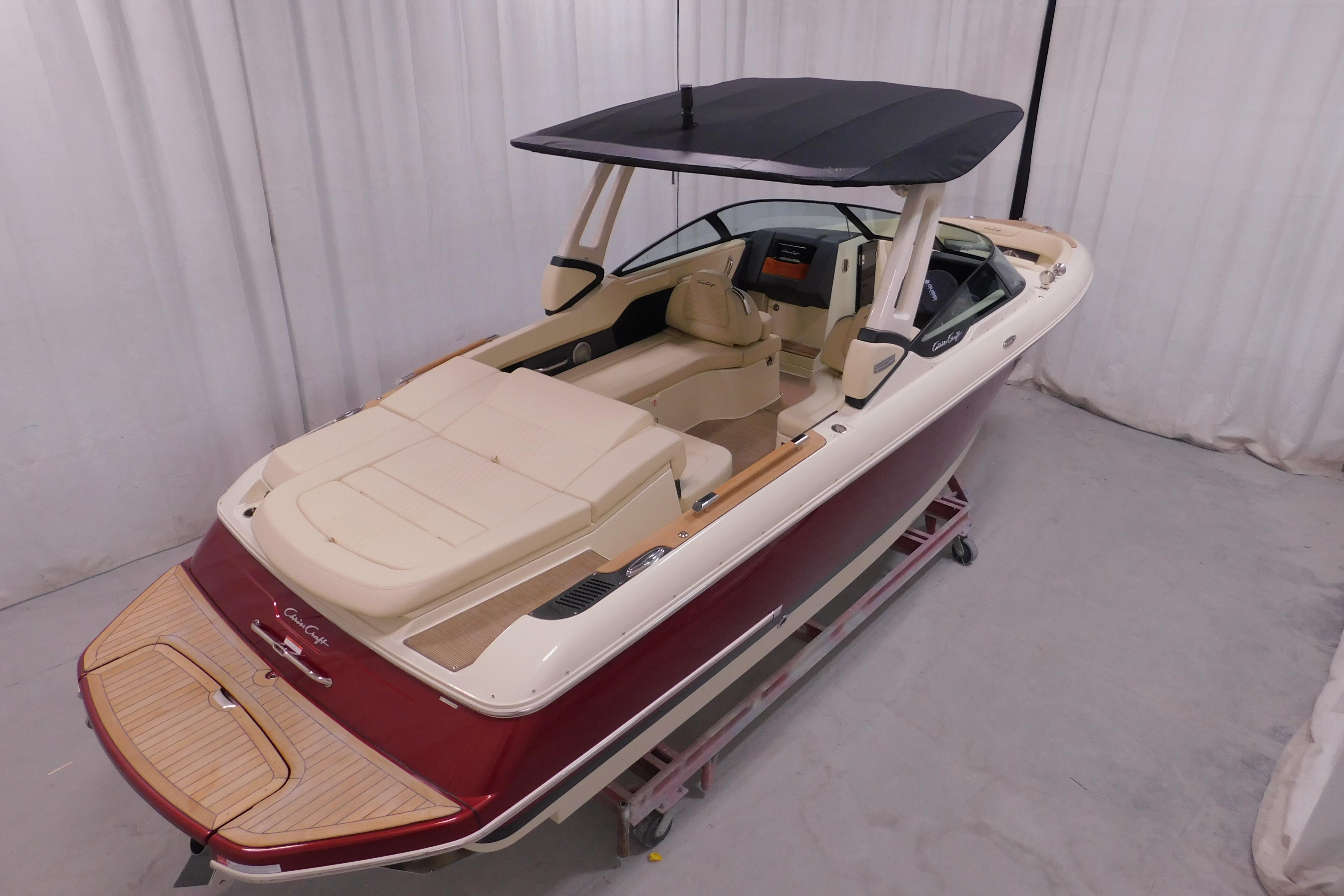 2026 Chris-Craft Sportster 28 boat with sleek design and spacious seating.