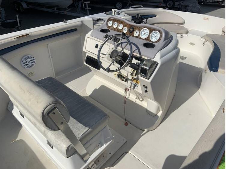 1997 Regal 200 DESTINY boat interior with steering wheel and dashboard.
