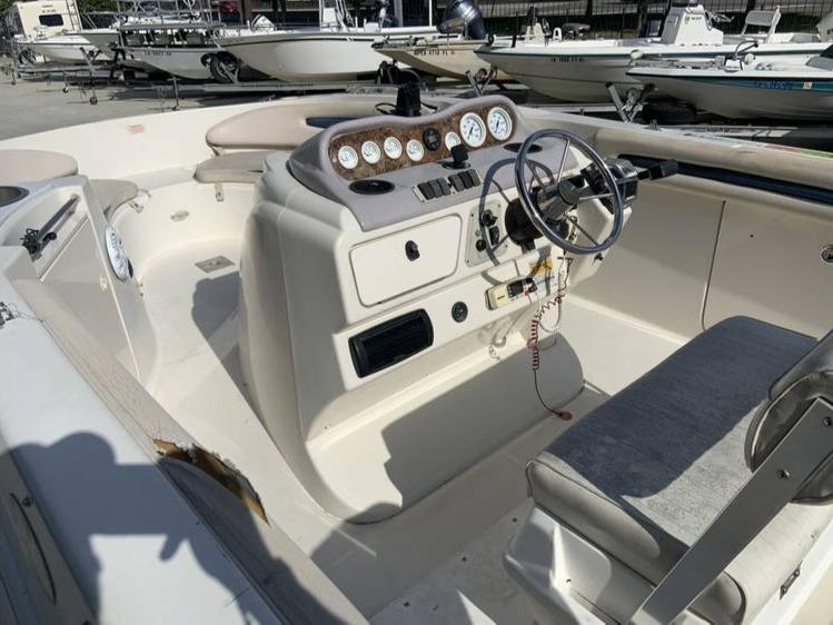 1997 Regal 200 DESTINY boat interior with steering wheel and control panel.