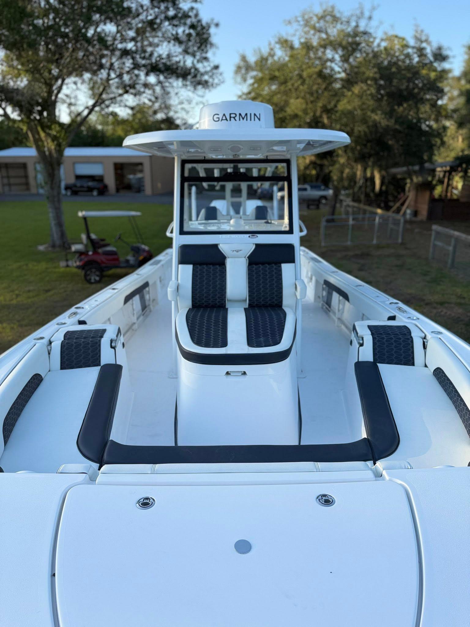 Tidewater-3100 Carolina Bay 2025 -FL-US-2025 Tidewater 3100 Carolina Bay boat with Garmin equipment, docked outdoors.-9803417 | Thumbnail