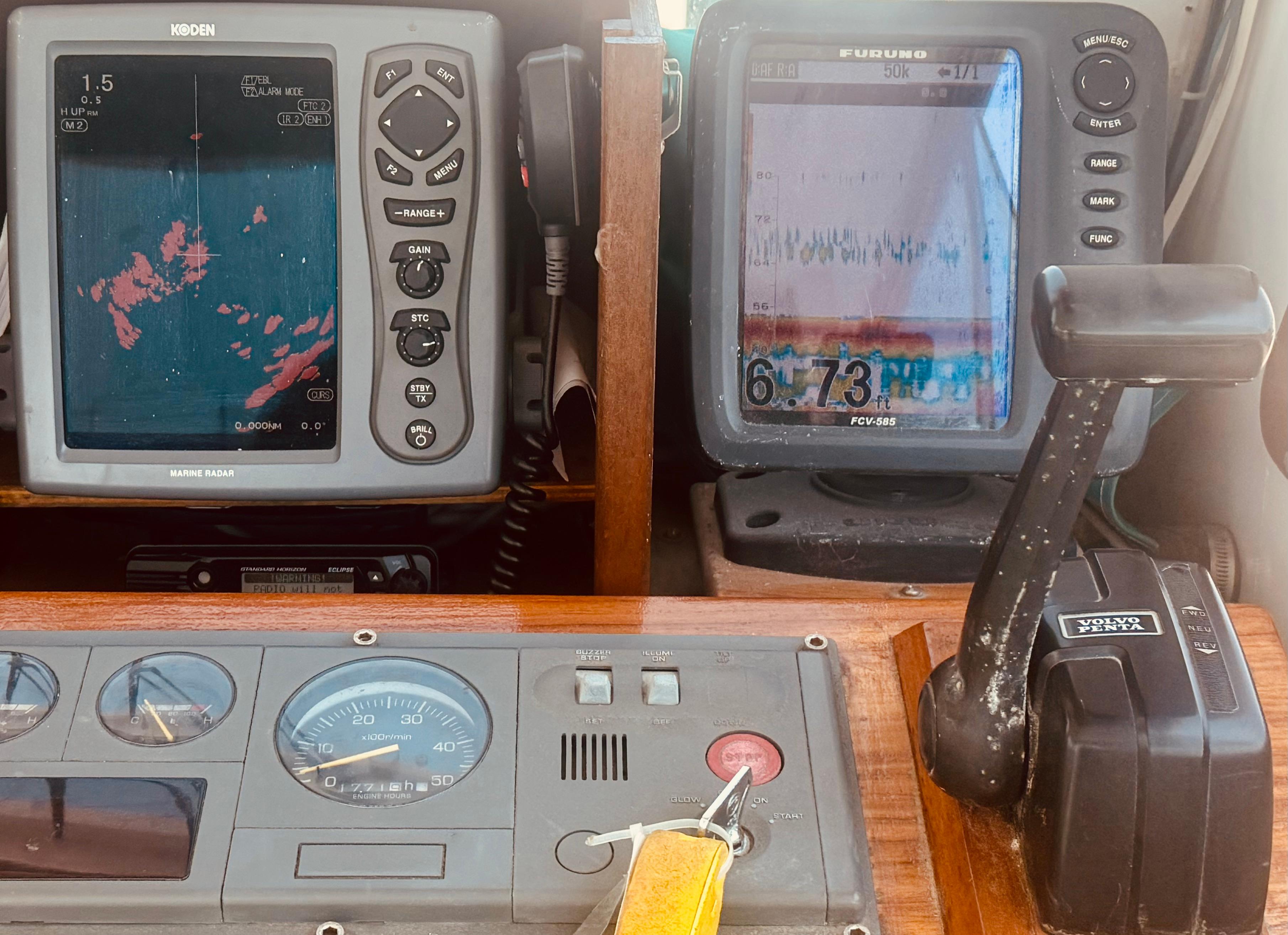 1974 Dyer 29' Sport Fisher dashboard with marine radar and navigation equipment.