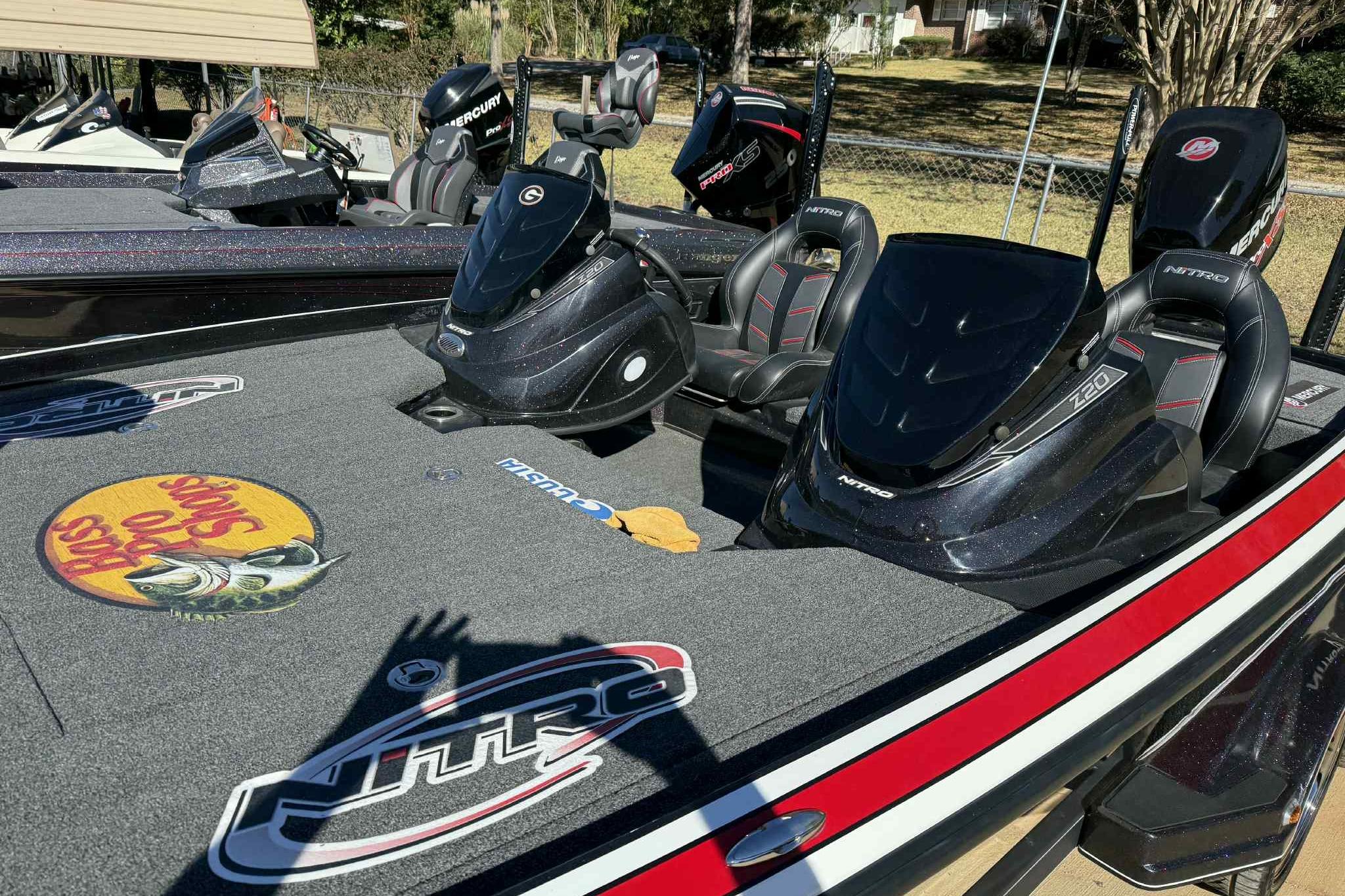 2017 Nitro Z20 Pro bass boat with custom decals and dual seats.