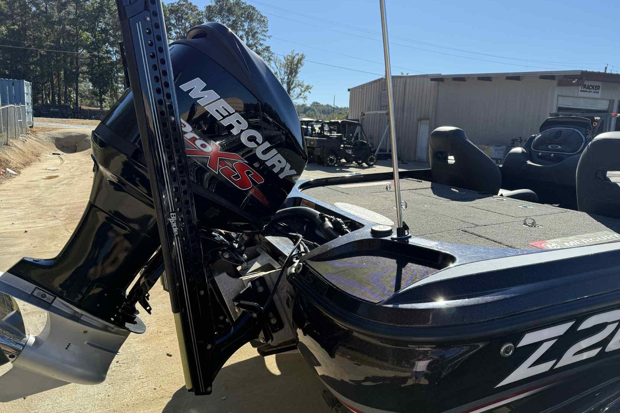 2017 Nitro Z20 Pro boat with Mercury 250XS engine, parked outdoors.