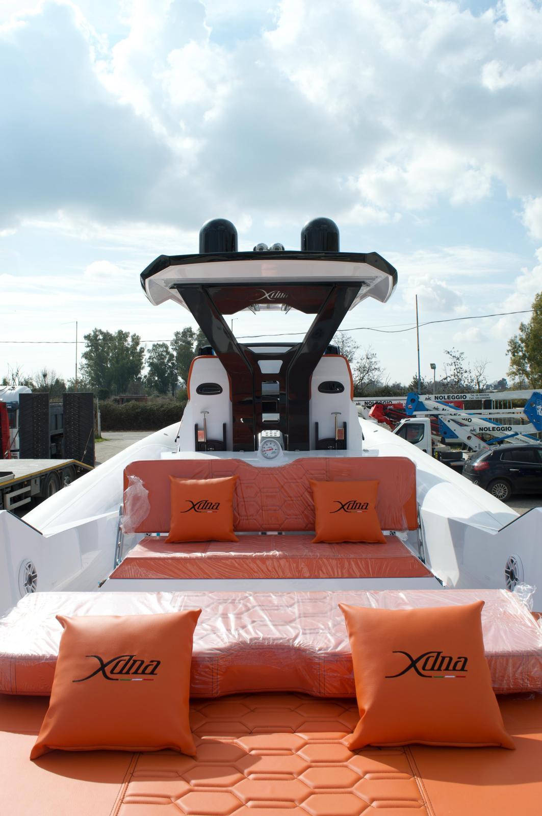 DNA-46 2026 -FL-US-Luxury DNA 46 yacht, 2025 model, with orange seating and cushions under a cloudy sky.-9703461 | Thumbnail