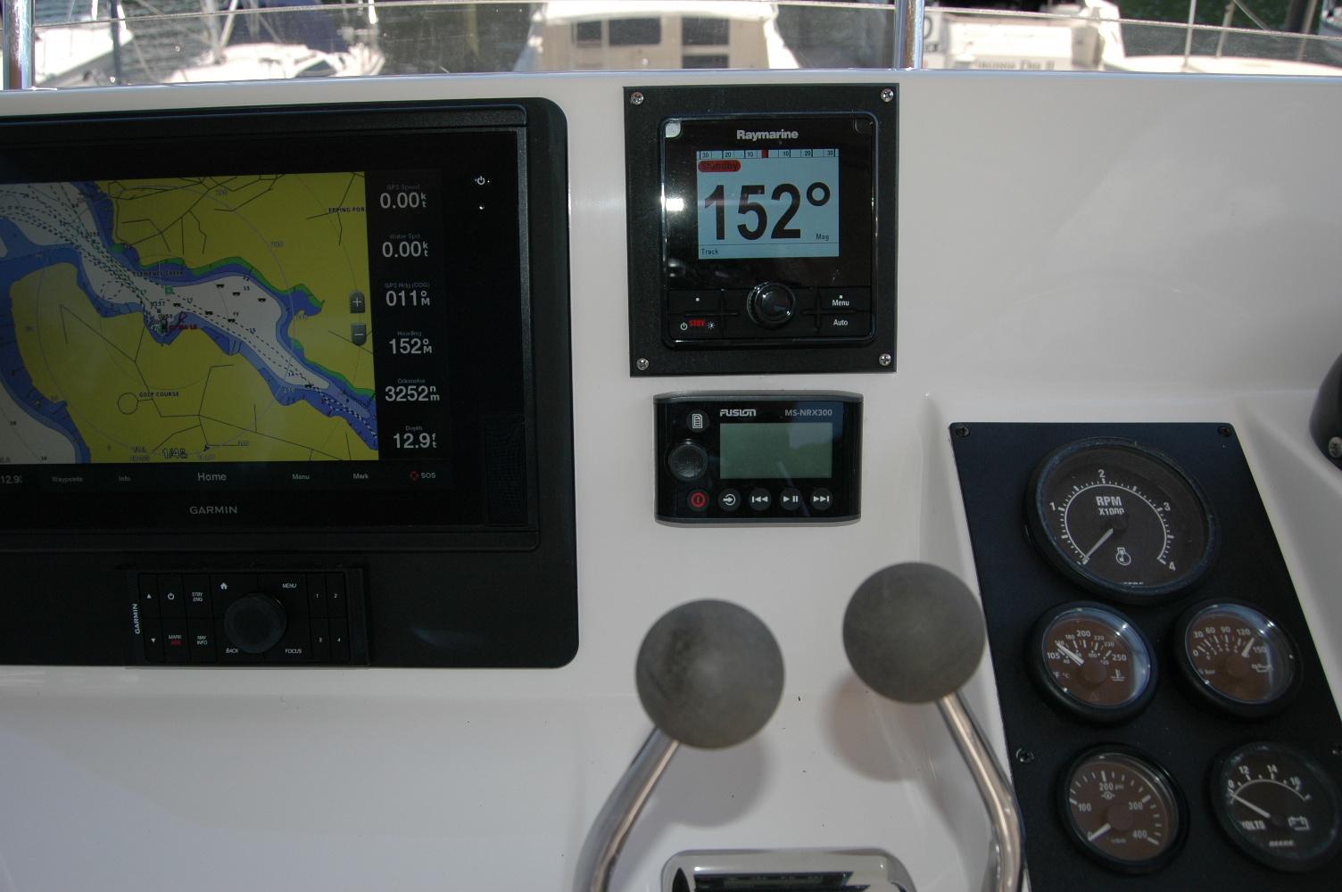 2006 Sabre 36 Flybridge Sedan dashboard with navigation and control instruments.