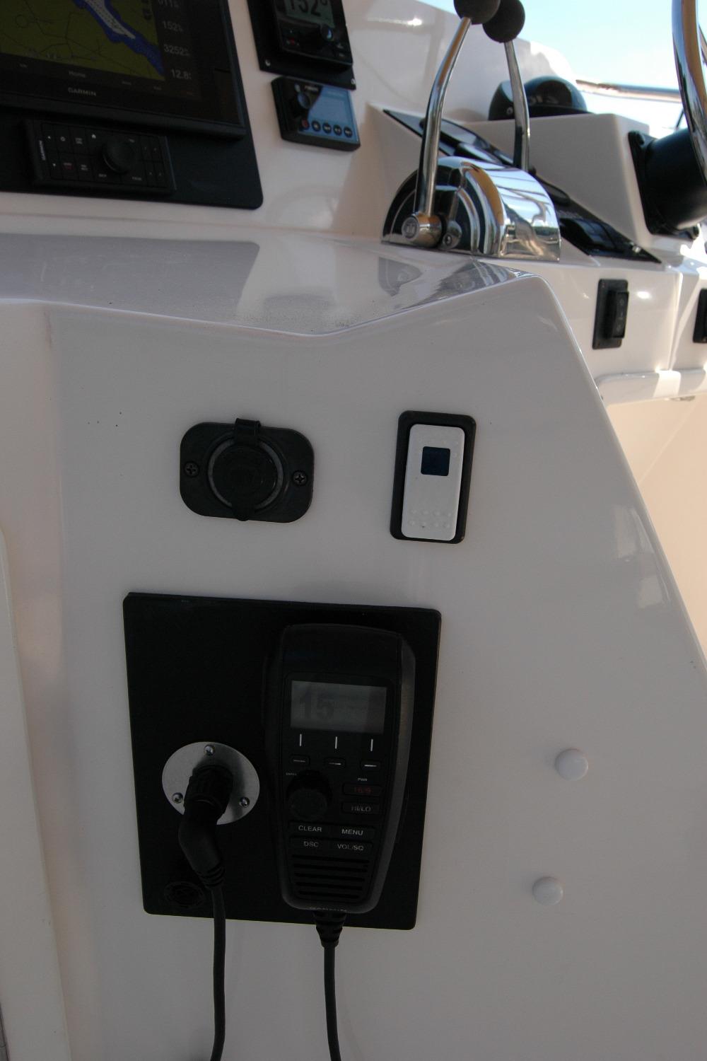 Control panel of 2006 Sabre 36 Flybridge Sedan with navigation and communication equipment.