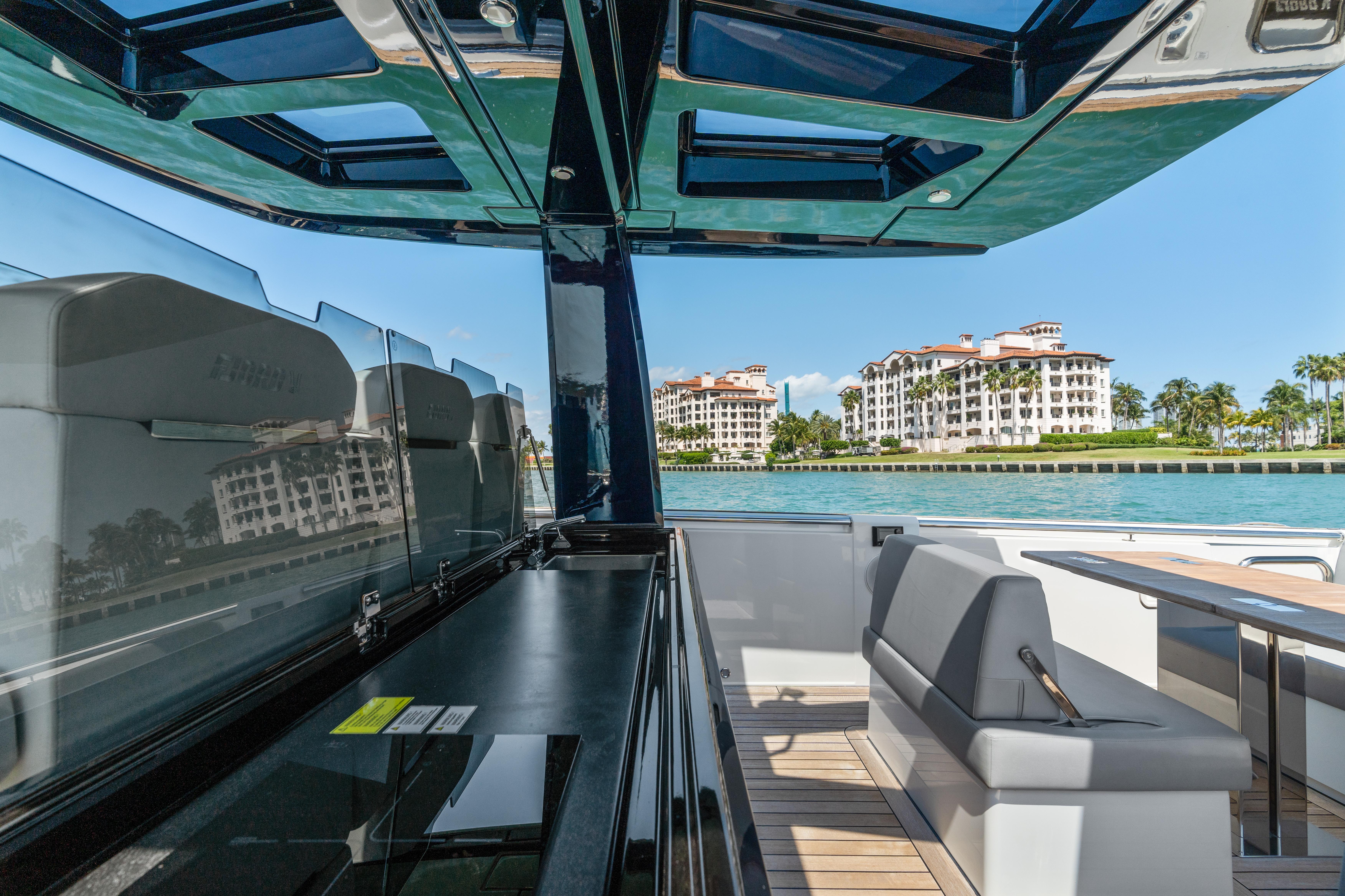 Fjord-44 Open 2022-HINJUICE FL-US-Luxurious 2022 Fjord 44 Open yacht interior with waterfront view and modern seating.-9860902 | Thumbnail