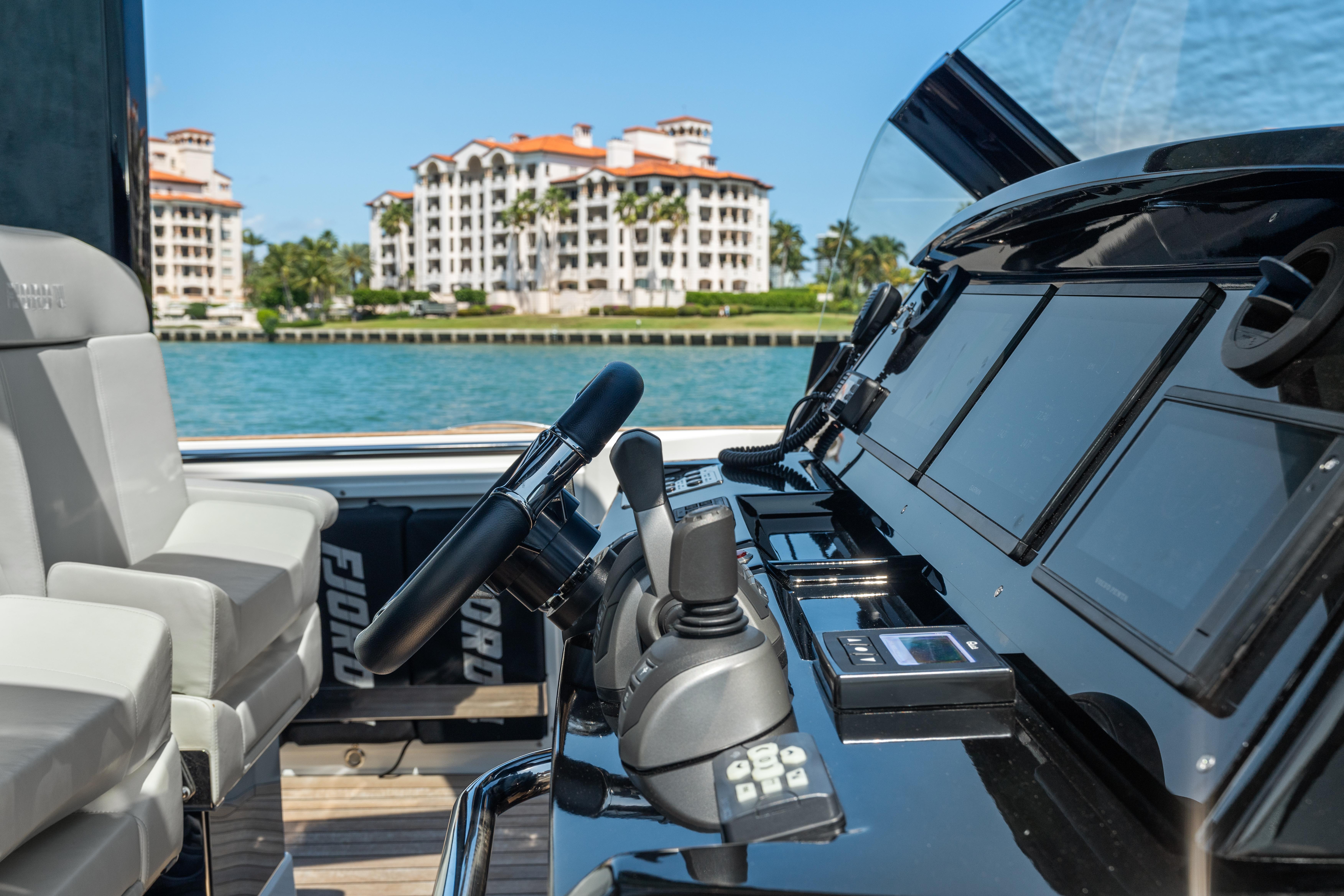 Fjord-44 Open 2022-HINJUICE FL-US-2022 Fjord 44 Open yacht cockpit with luxury waterfront view.-9860902 | Thumbnail