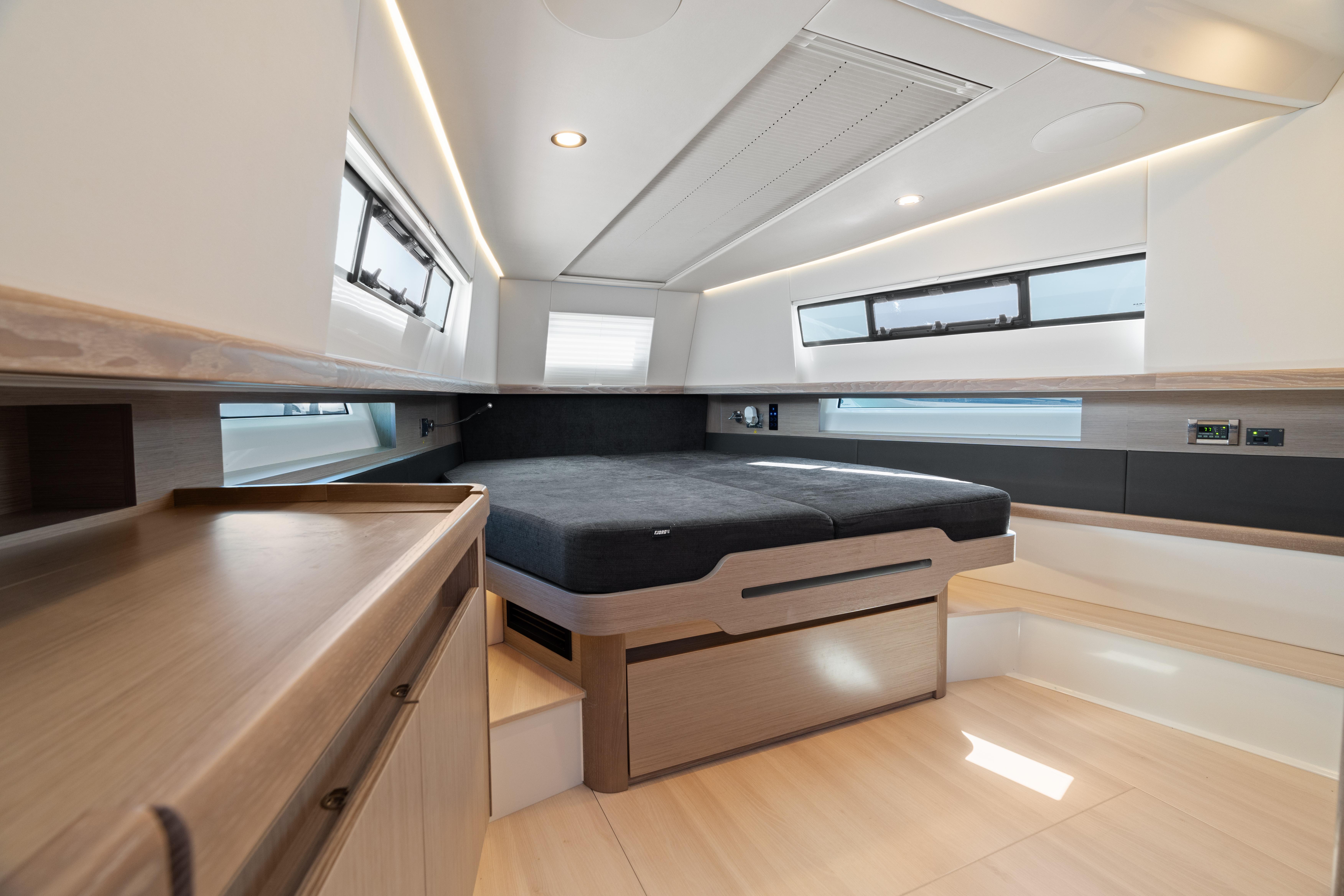 Fjord-44 Open 2022-HINJUICE FL-US-Modern interior of 2022 Fjord 44 Open yacht cabin with sleek design and ample natural light.-9860902 | Thumbnail