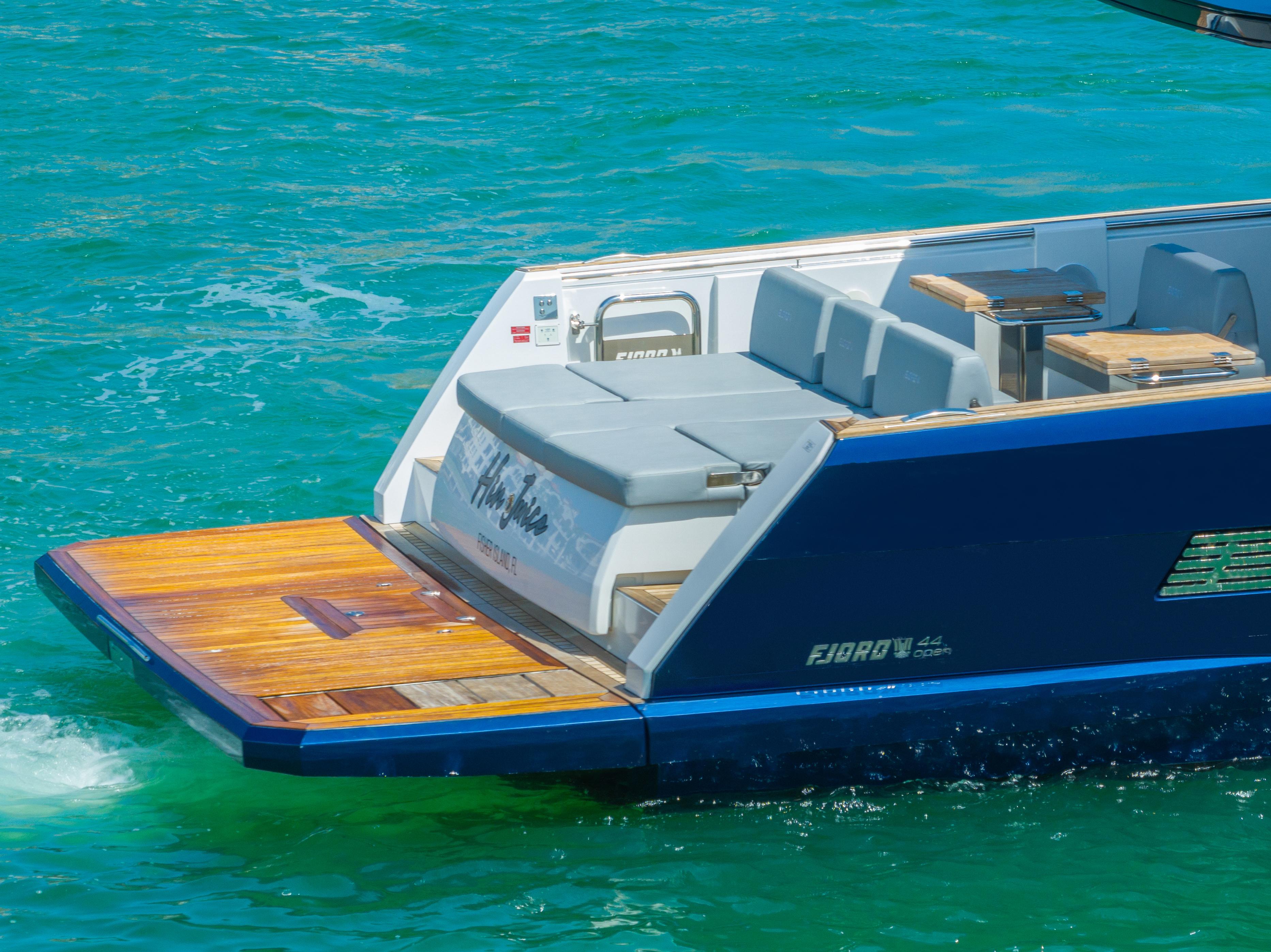 Fjord-44 Open 2022-HINJUICE FL-US-Fjord 44 Open 2022 yacht on turquoise water, featuring sleek design and spacious deck.-9860902 | Thumbnail
