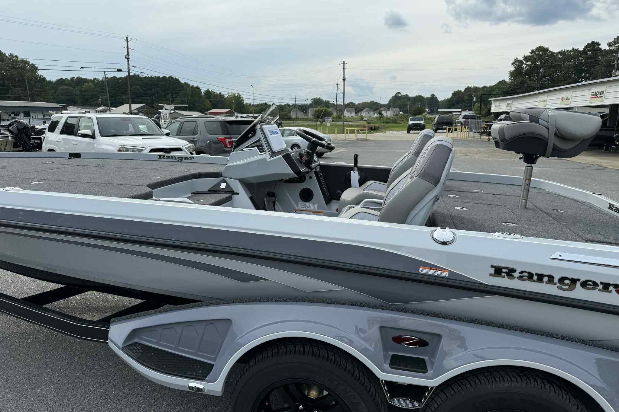 2026 Ranger Z521 boat in a parking lot, showcasing sleek design and modern features.
