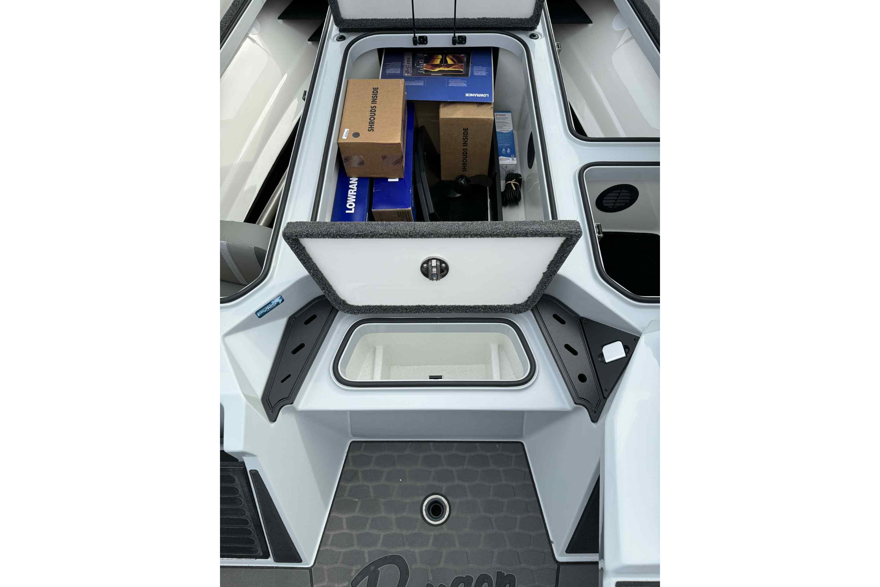 2026 Ranger Z521 boat storage compartment with equipment and accessories.