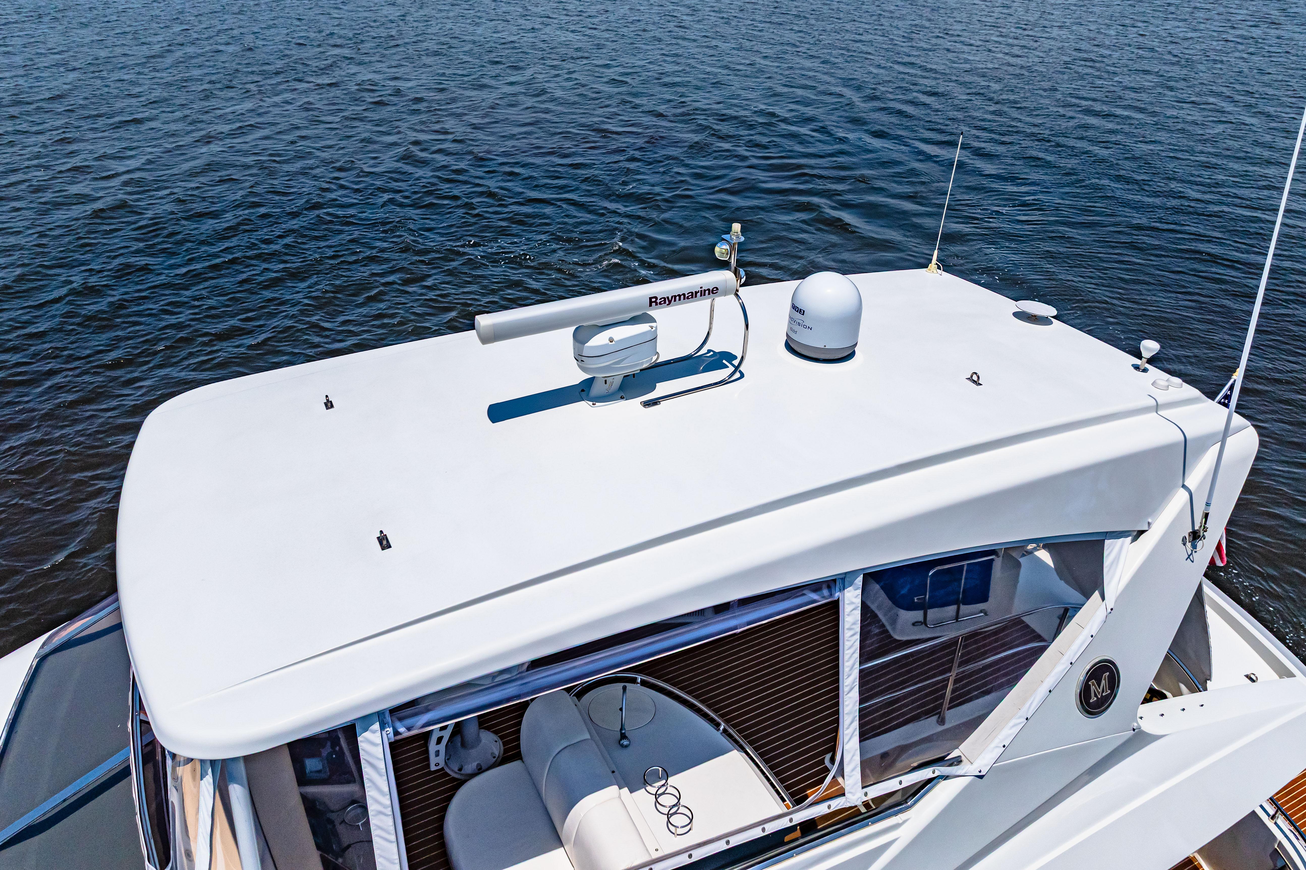 Marquis-59 2005-Victory FL-US-2005 Marquis 59 yacht top view with radar equipment on calm water.-9773566 | Thumbnail