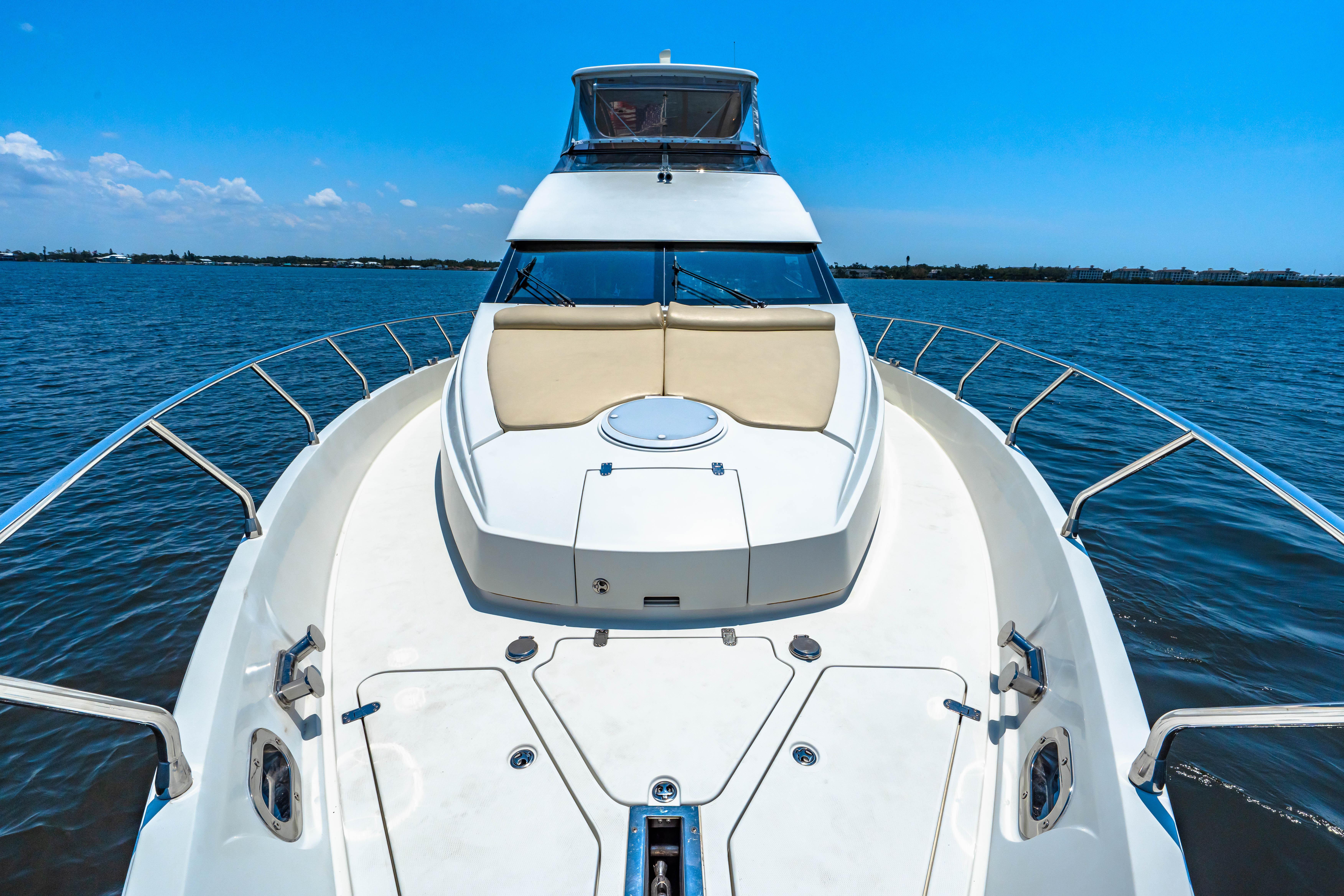 Marquis-59 2005-Victory FL-US-2005 Marquis 59 yacht on open water under clear blue sky.-9773566 | Thumbnail