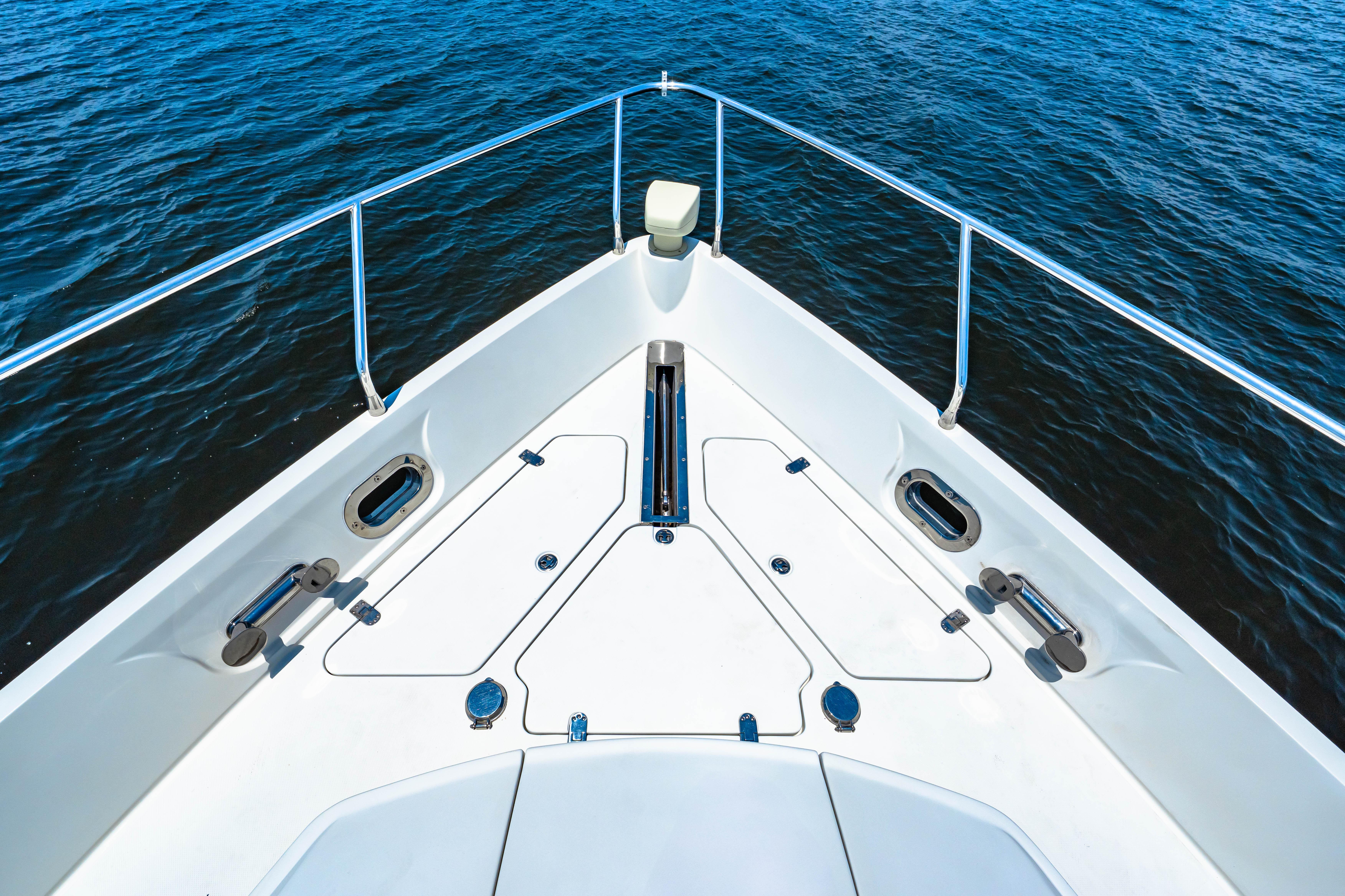 Marquis-59 2005-Victory FL-US-Bow of 2005 Marquis 59 yacht on open water, showcasing sleek design and railing.-9773566 | Thumbnail