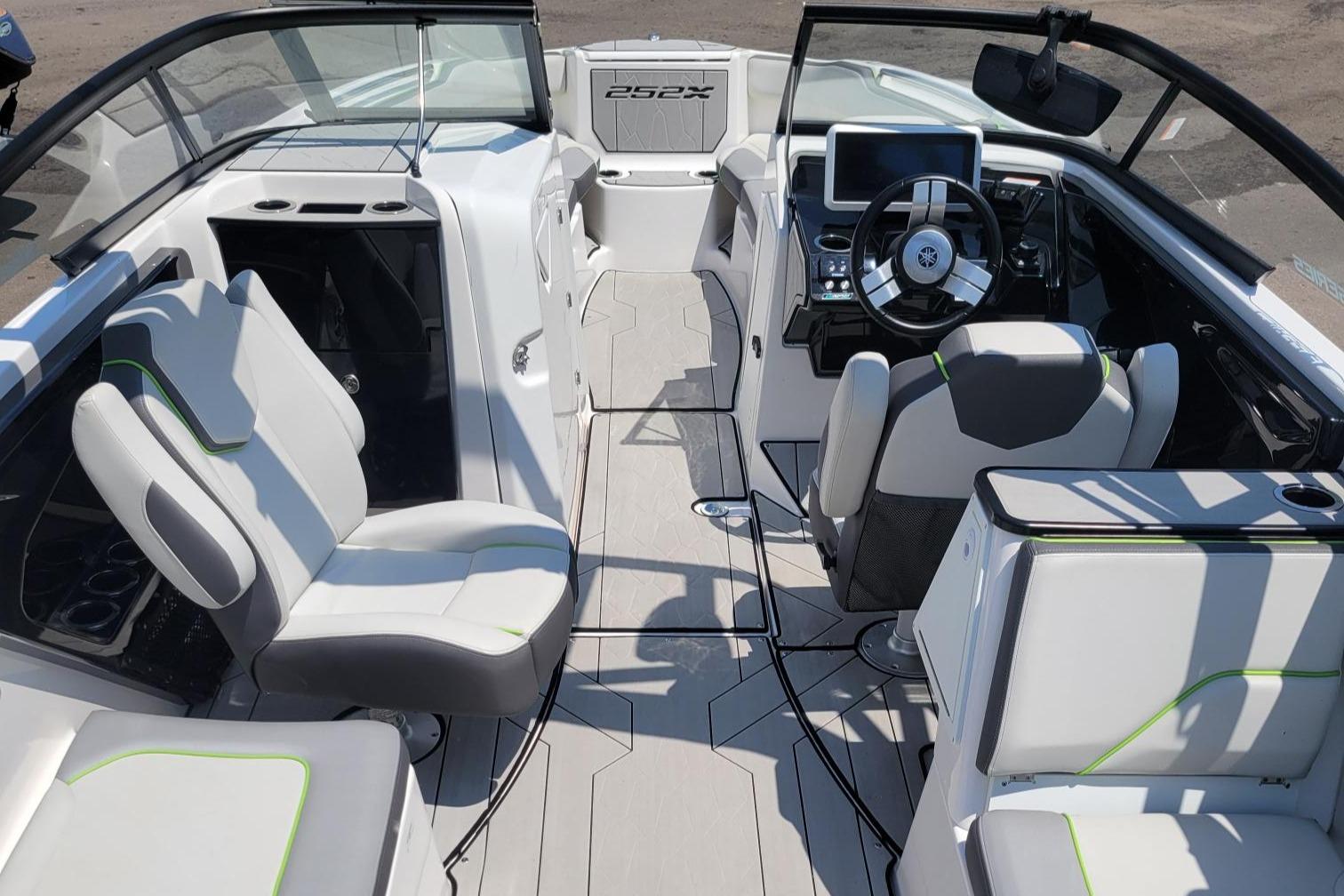 2021 Yamaha Boats 252XE interior with modern seating and dashboard design.