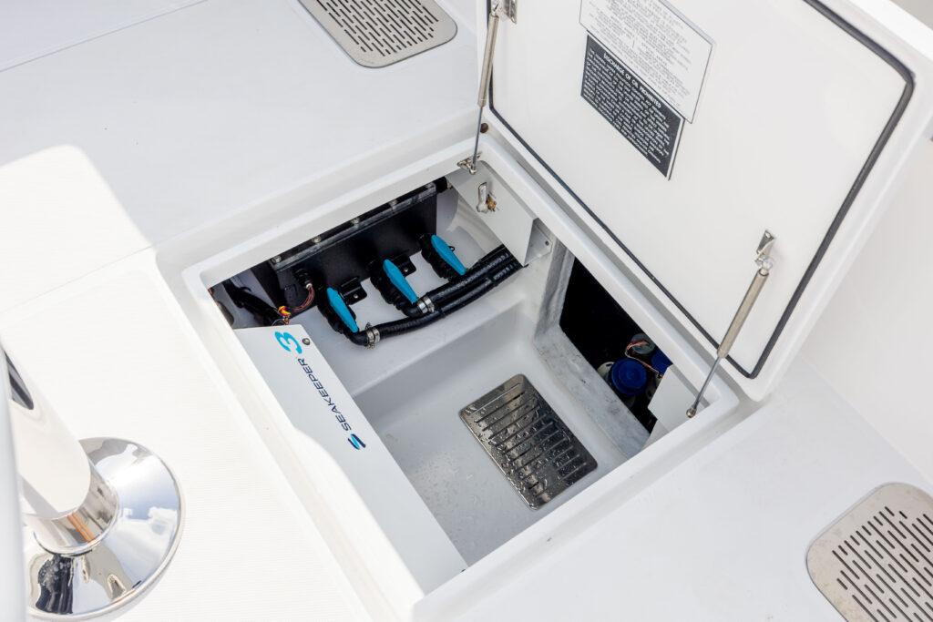 Front Runner-39 CC Custom 2026 -FL-US-Open hatch of 2024 Front Runner 39 CC Custom boat showing internal components.-9053590 | Thumbnail