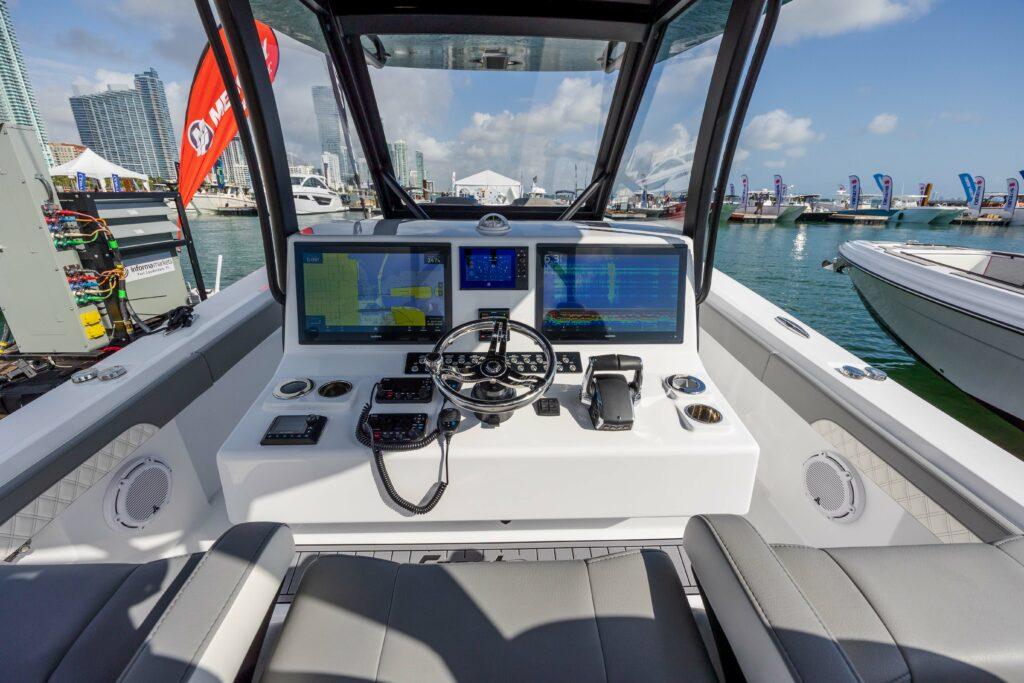 Front Runner-39 CC Custom 2026 -FL-US-2024 Front Runner 39 CC Custom boat helm with advanced navigation systems at marina.-9053590 | Thumbnail