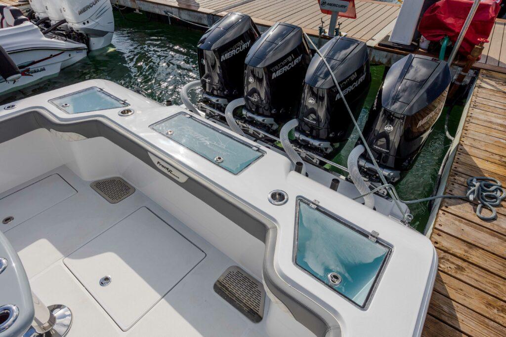 Front Runner-39 CC Custom 2026 -FL-US-2024 Front Runner 39 CC Custom boat with four Mercury outboard engines docked.-9053590 | Thumbnail