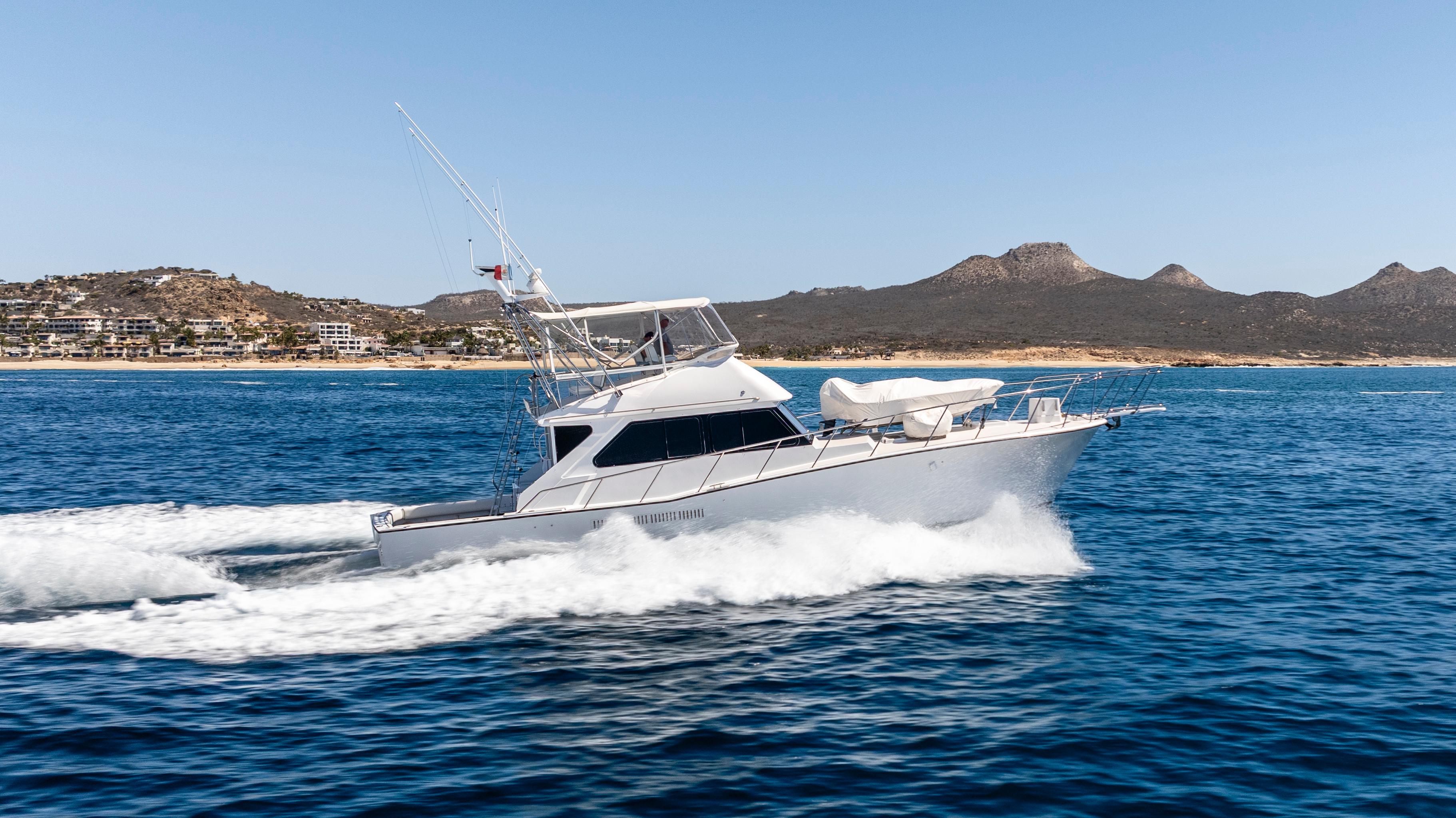 Pacifica-50 Convertible 1983-Bull Pen CA-US-1983 Pacifica 50 Convertible yacht cruising on open water with scenic mountain backdrop.-9793604 | Thumbnail