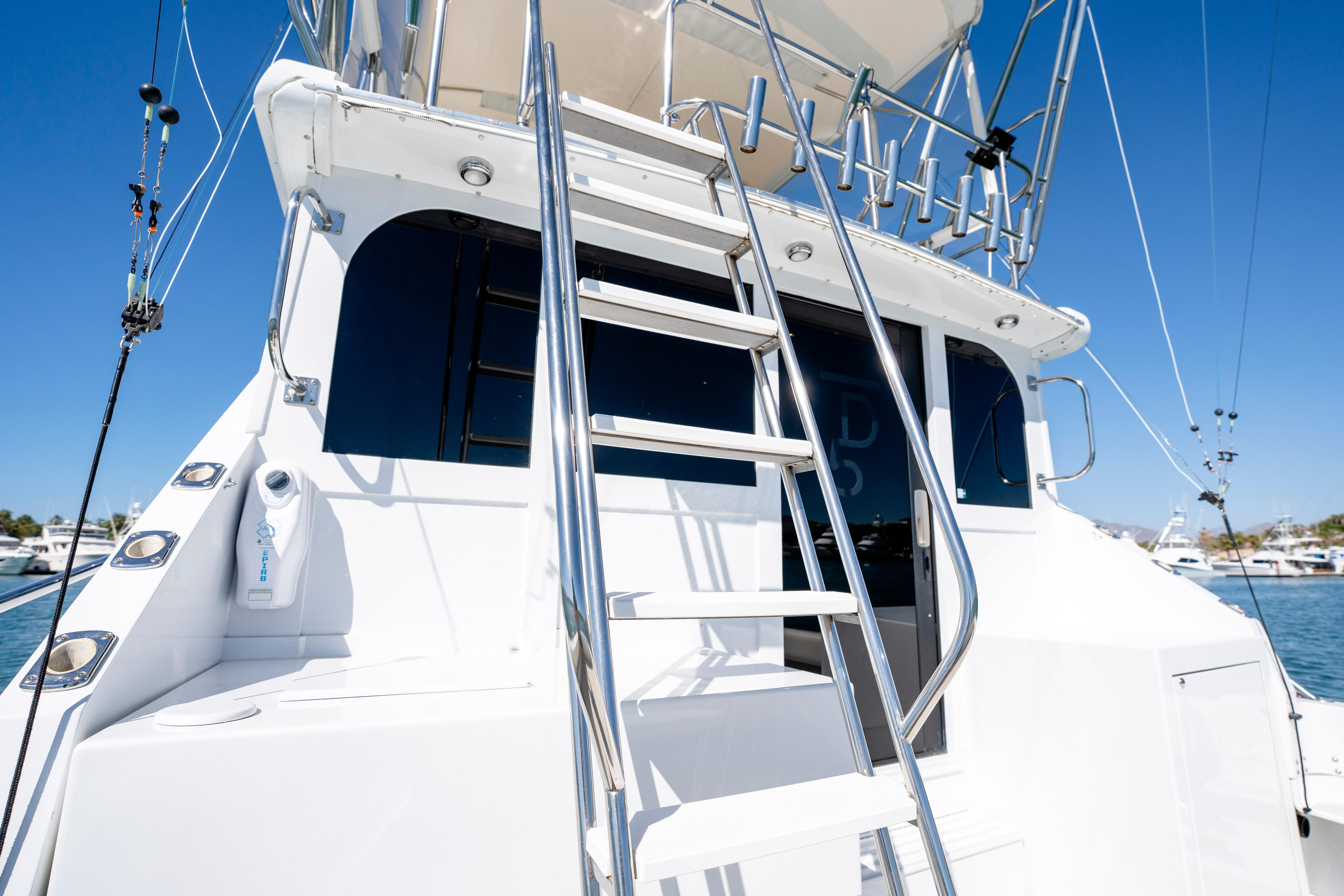 Pacifica-50 Convertible 1983-Bull Pen CA-US-1983 Pacifica 50 Convertible yacht with ladder and upper deck, under clear blue sky.-9793604 | Thumbnail