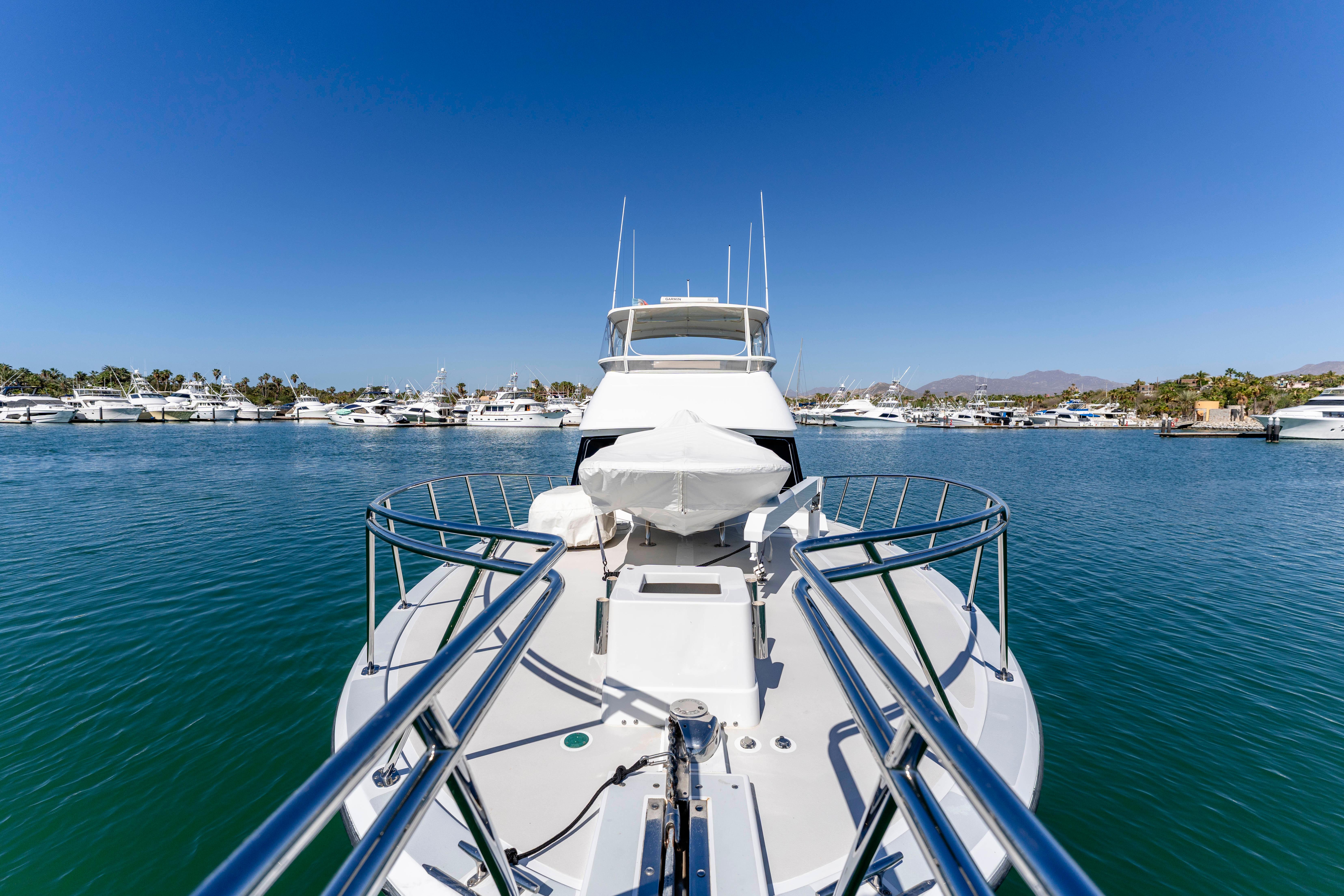 Pacifica-50 Convertible 1983-Bull Pen CA-US-1983 Pacifica 50 Convertible yacht docked in a marina under clear blue skies.-9793604 | Thumbnail