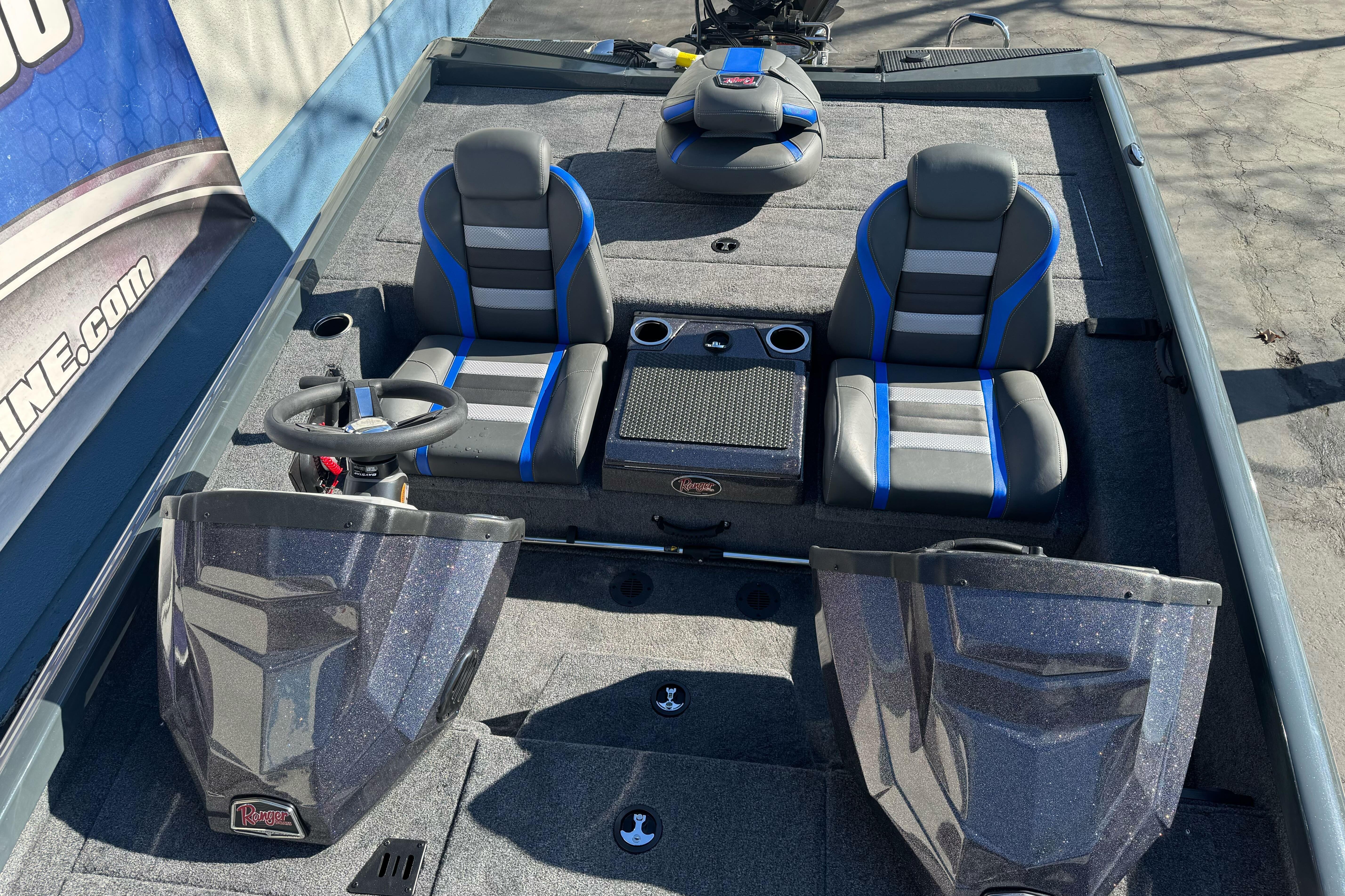 2026 Ranger RT188P boat interior with dual seats and steering wheel, featuring modern design.